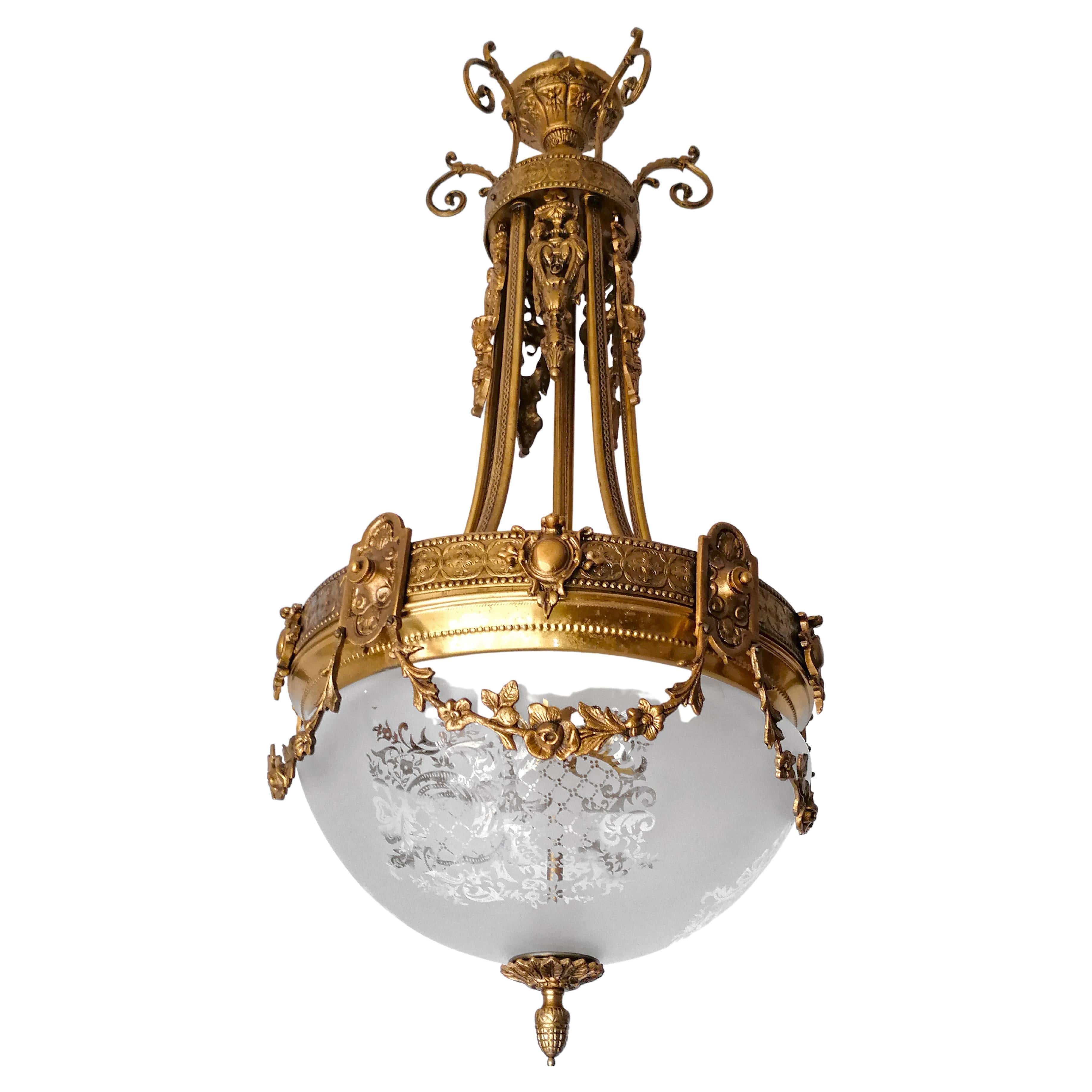 Brass French Art Nouveau and Art Deco Chandelier in Gilt Bronze and Empire Caryatids For Sale