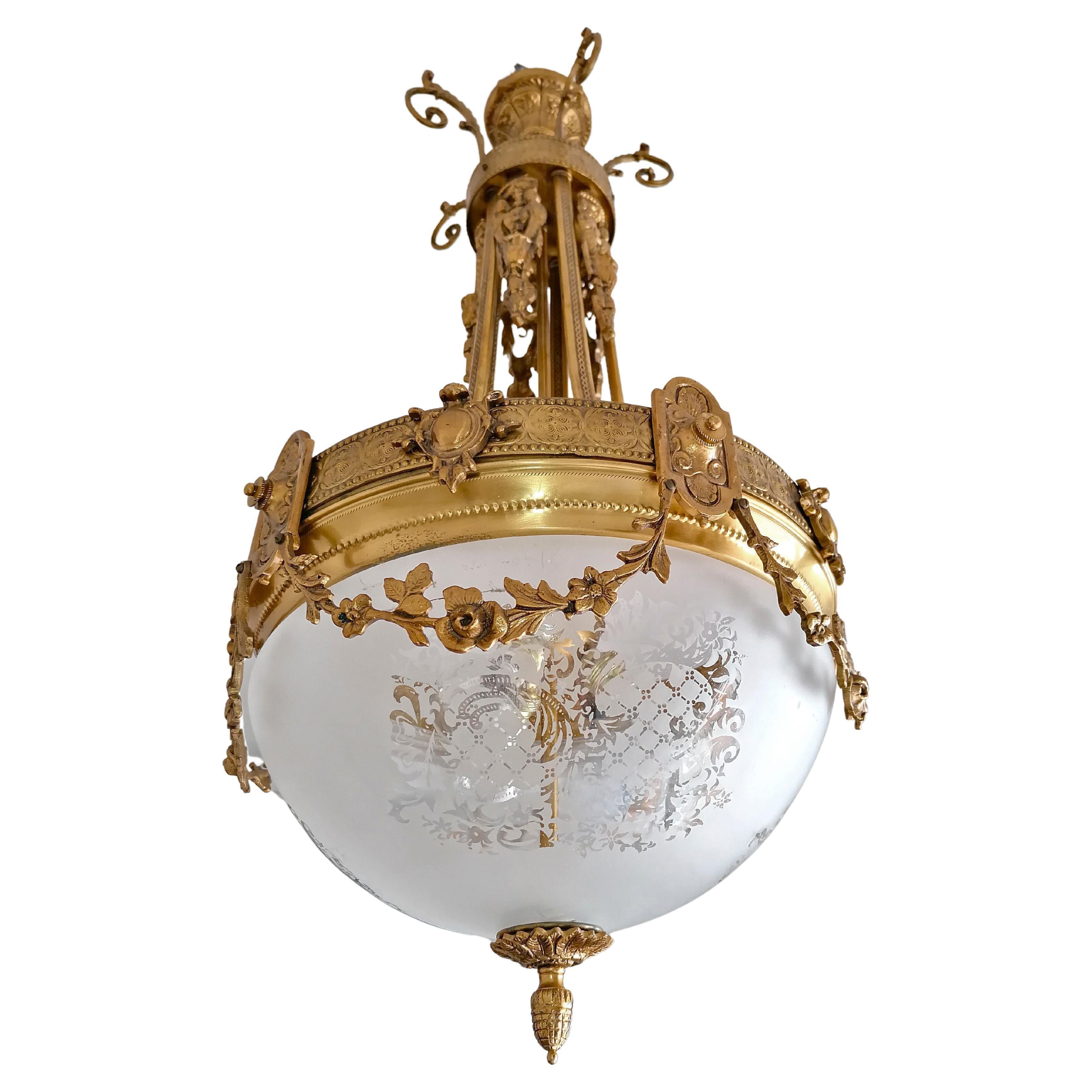 XX secolo Lampadario francese Art Nouveau e Art Déco in bronzo dorato e cariatidi Impero in vendita