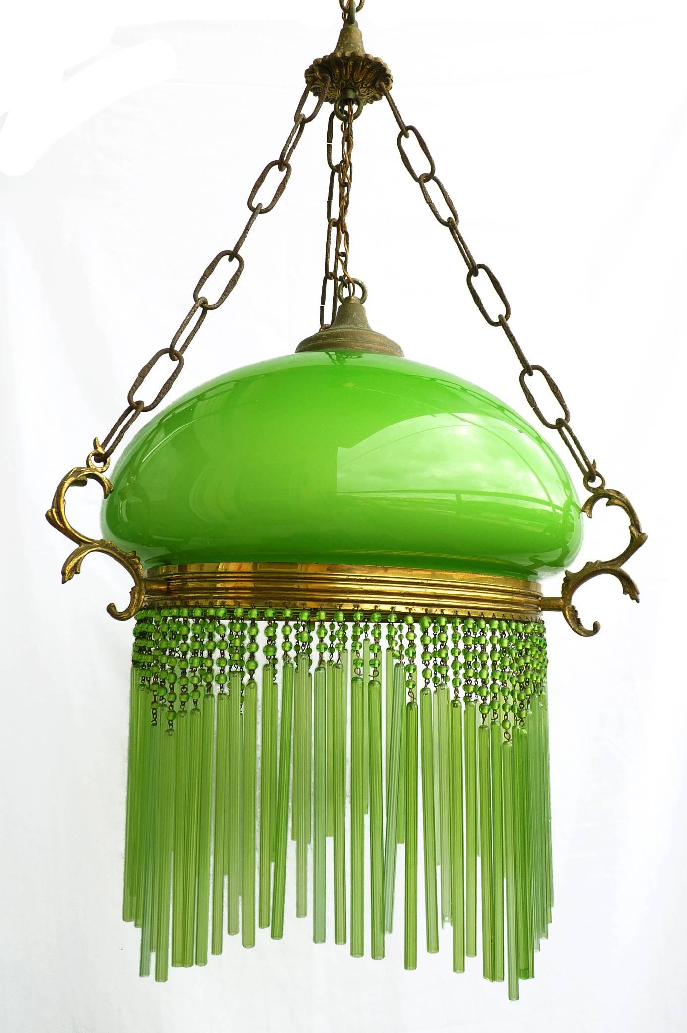 Beautiful large Italian Art Nouveau/Art Deco chandelier or hanging lamp with opaline cased green glass shade and green glass straws
Measures:
Diameter 20 inches / 50 cm
Height 36 inches / 90 cm
Weight: 9 lb. (4 kg)
One light bulb E27-60 W, good