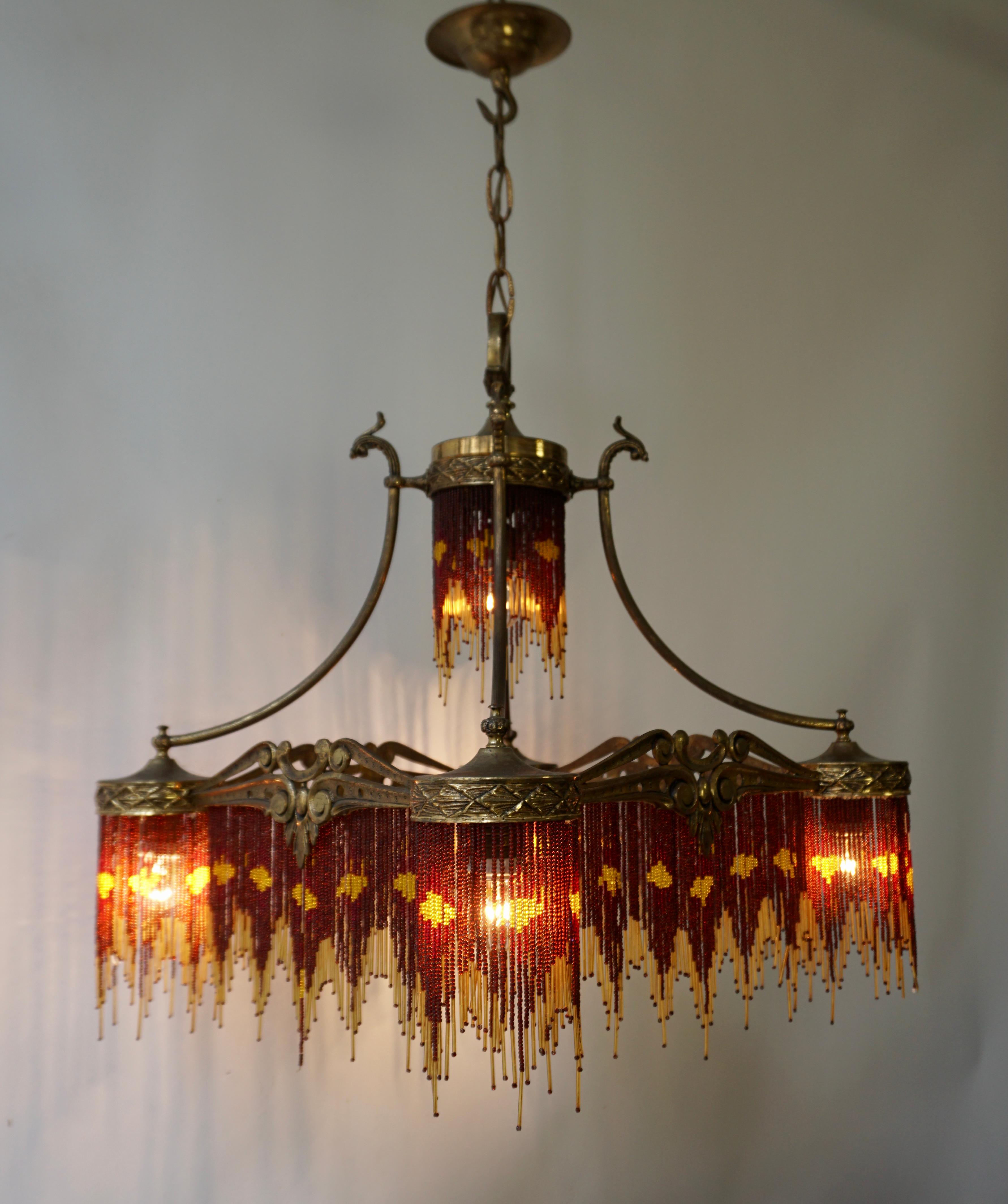 French Art Nouveau and Art Deco Amber Glass Straws Beaded Fringe Chandelier In Good Condition In Antwerp, BE