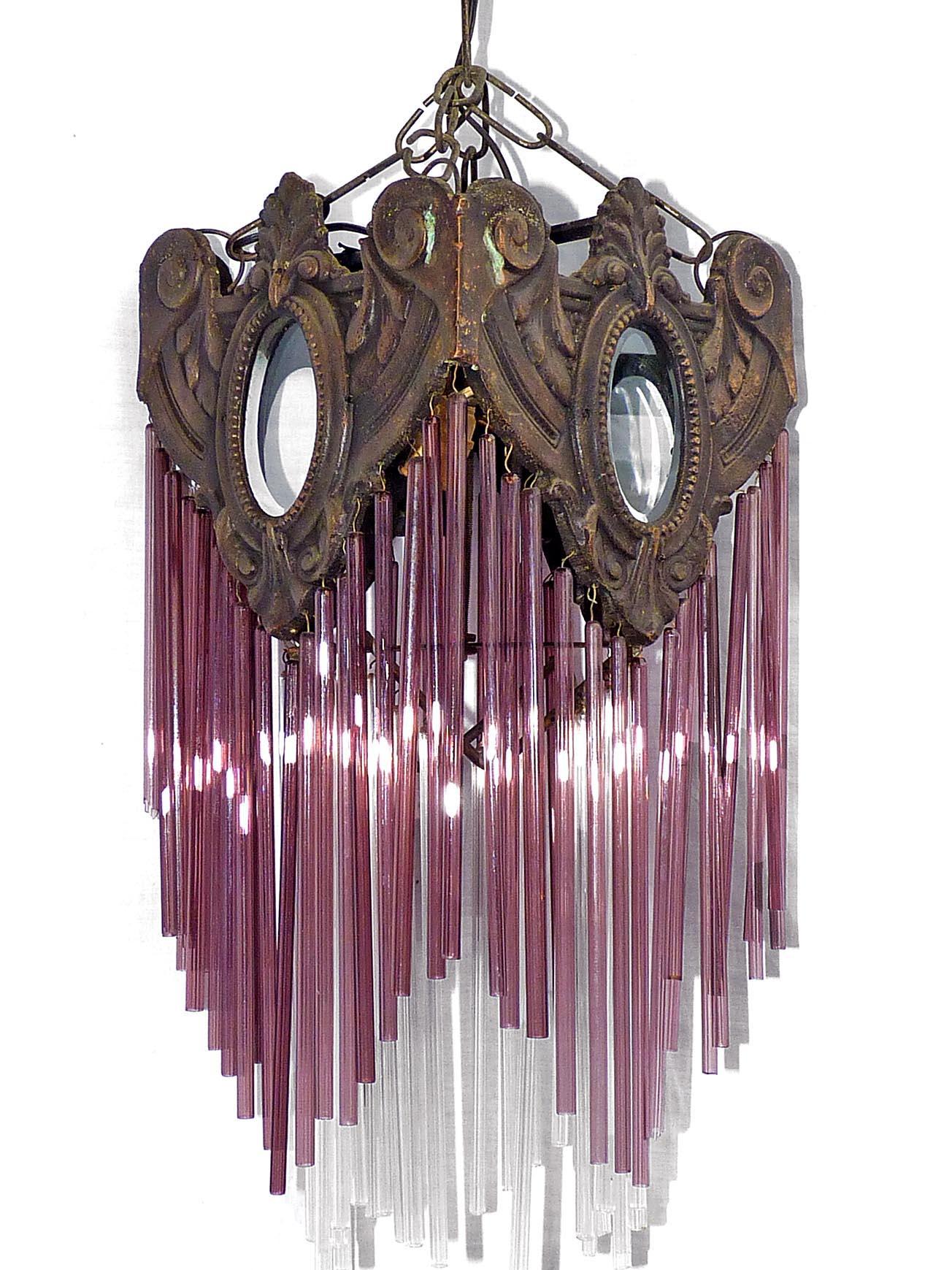 Beautiful antique French Art Nouveau Art Deco bronze lantern and purple and clear glass straw fringe, 2 tiers. Age Patina,
Measures:
Depth 7.8 in /20 cm
Width 7.8 in /20 cm
Diagonal 10.6 in/ 27 cm
Height 39.3 in (19.6 in + 19.6 in/chain) / 100 cm