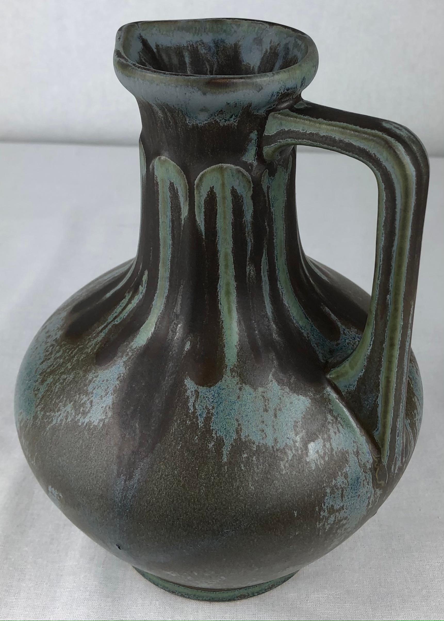 A stunning art nouveau or art deco transition period attributed to French art pottery from La Société Denert et Balichon, known as Denbac Pottery of Vierzon, dating circa 1930. 

Denbac's grès flammés (flamed sandstone) glazes are unique to every