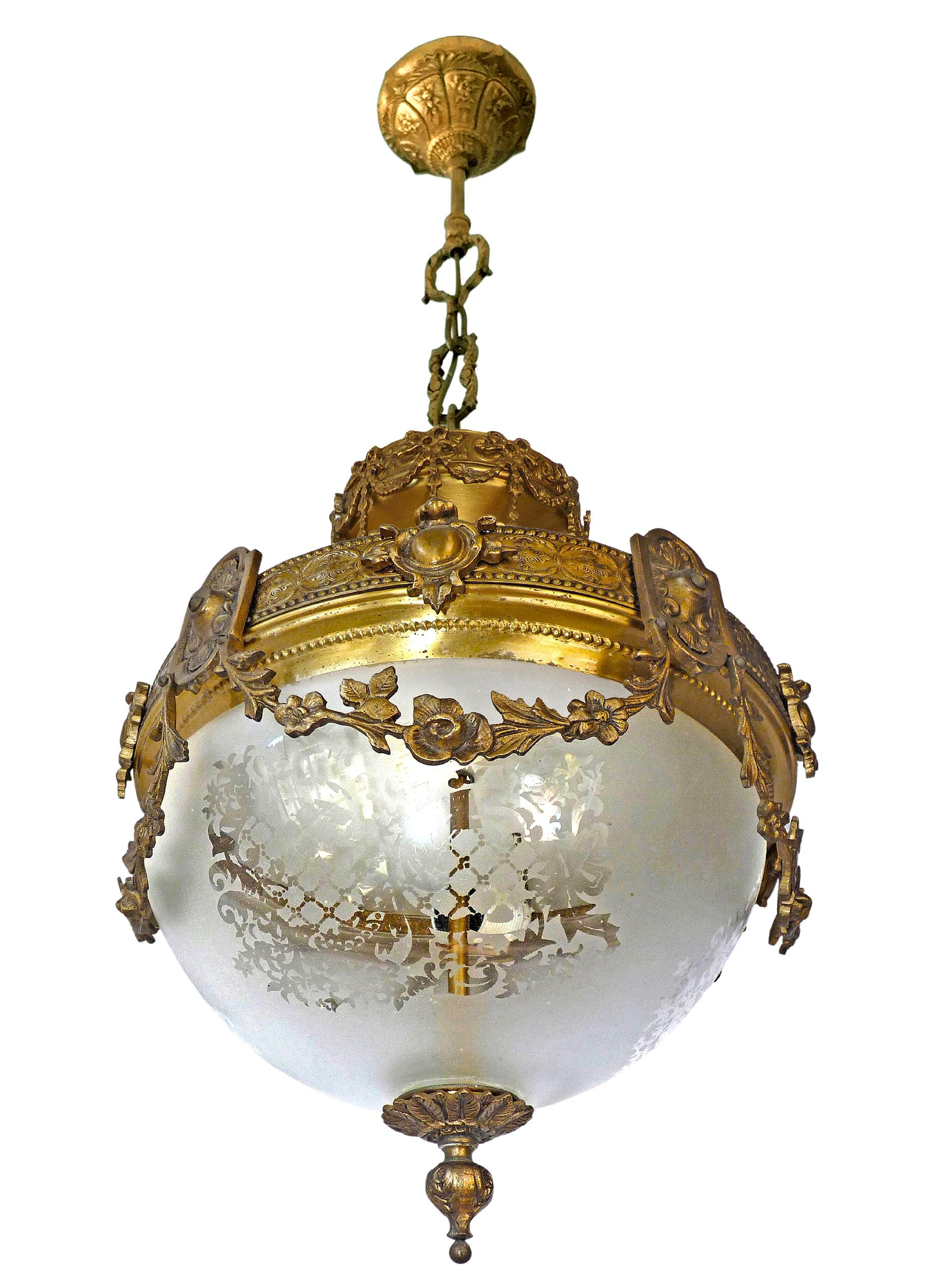 A wonderful gilt bronze and etched-glass two-light ceiling fixture decorated with Fine ornaments and garlands, France, early 20th century.
In very good condition - original etched-glass shades without damages, bronze with beautiful patina.
Two