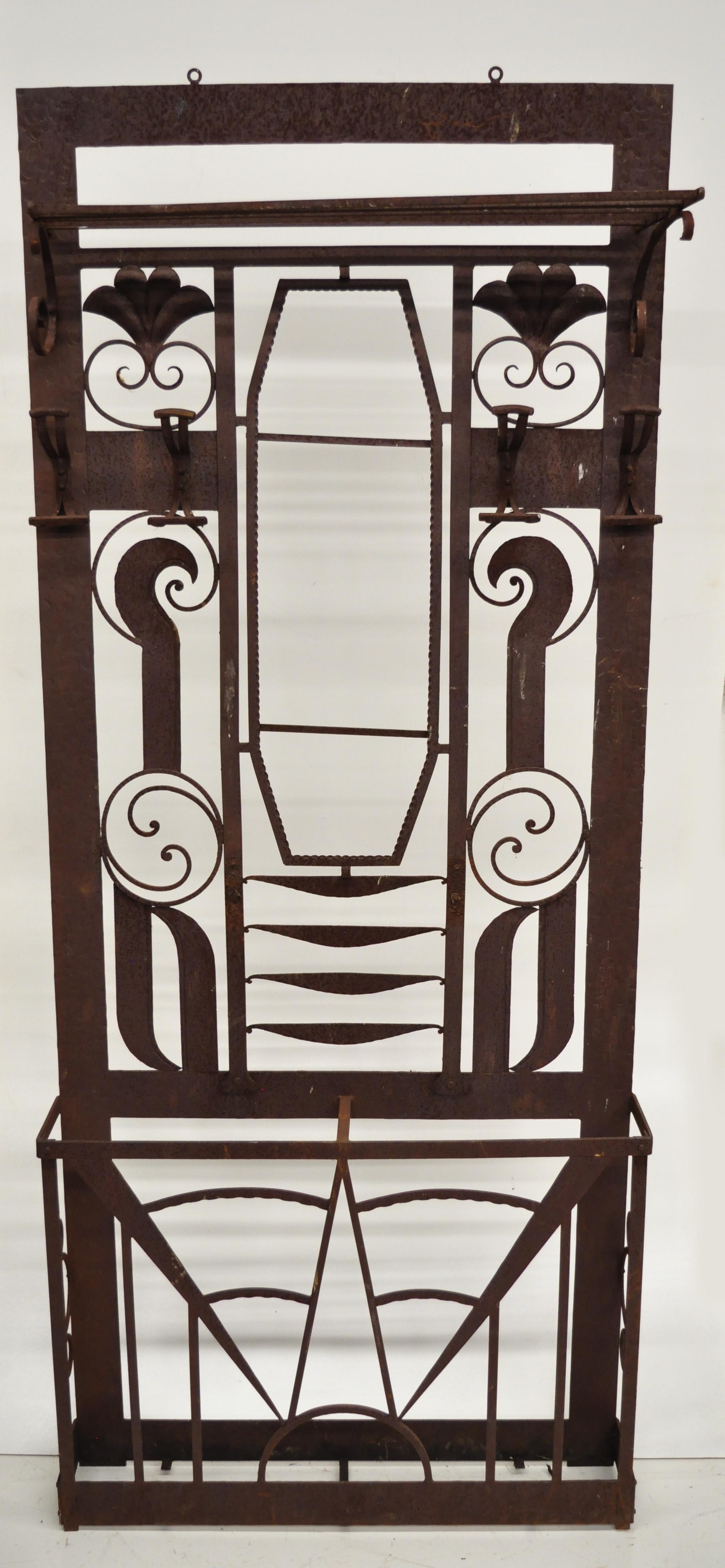 Antique French Art Nouveau / Art Deco wrought iron hall tree in the Edgar Brandt style. Item features a top shelf, fancy scroll work, coat and hat hooks, should mount to wall, currently unfinished, 85 lbs, can take a mirror but does not include