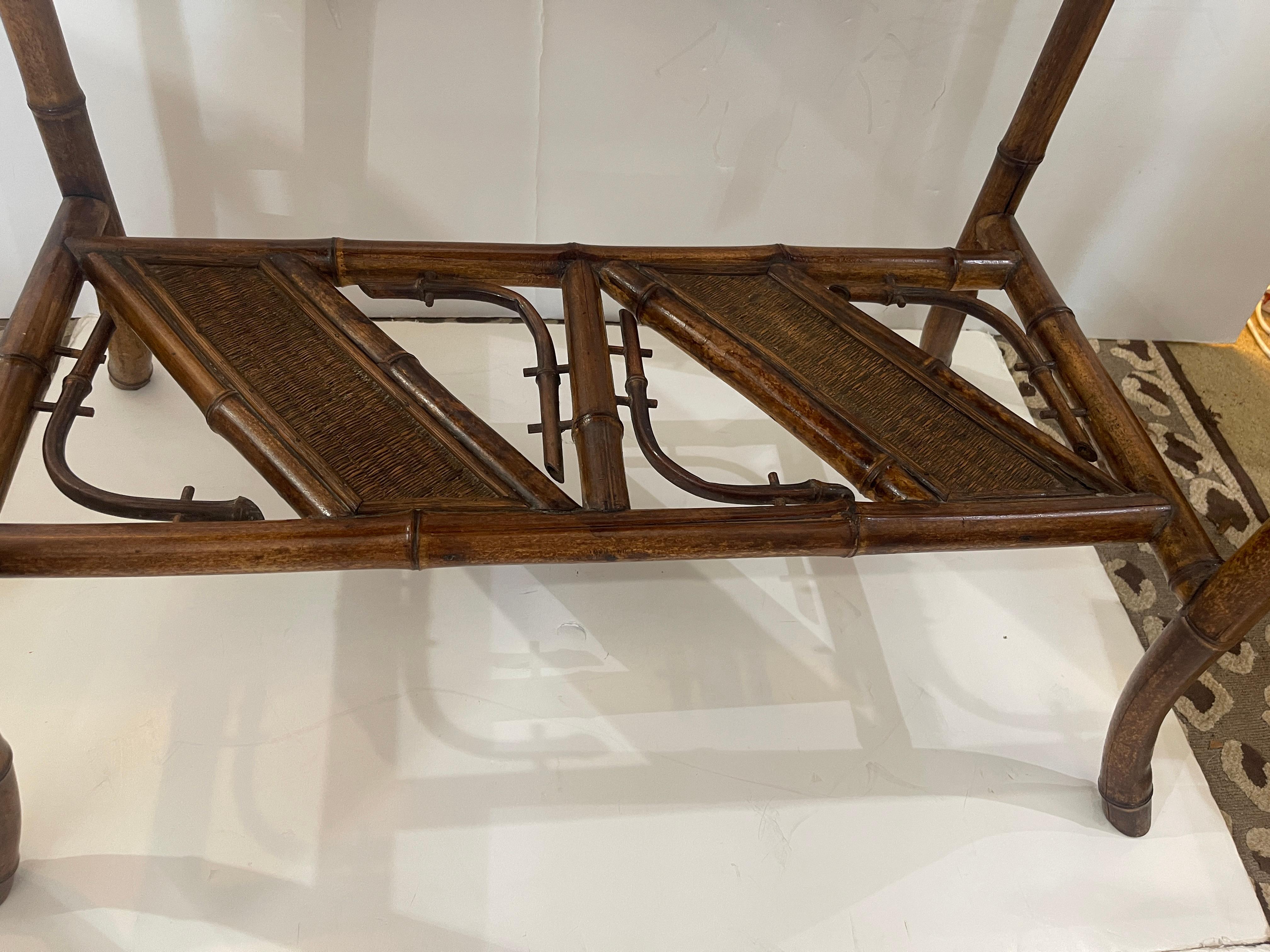 This is a stunning French Art-Nouveau Bamboo Center Table or Tea Table
This is the same period as the Aesthetic Mouvement in England during that time period,  1890-1910..
The table to has the original woven Grasscloth from that period.
The patina is
