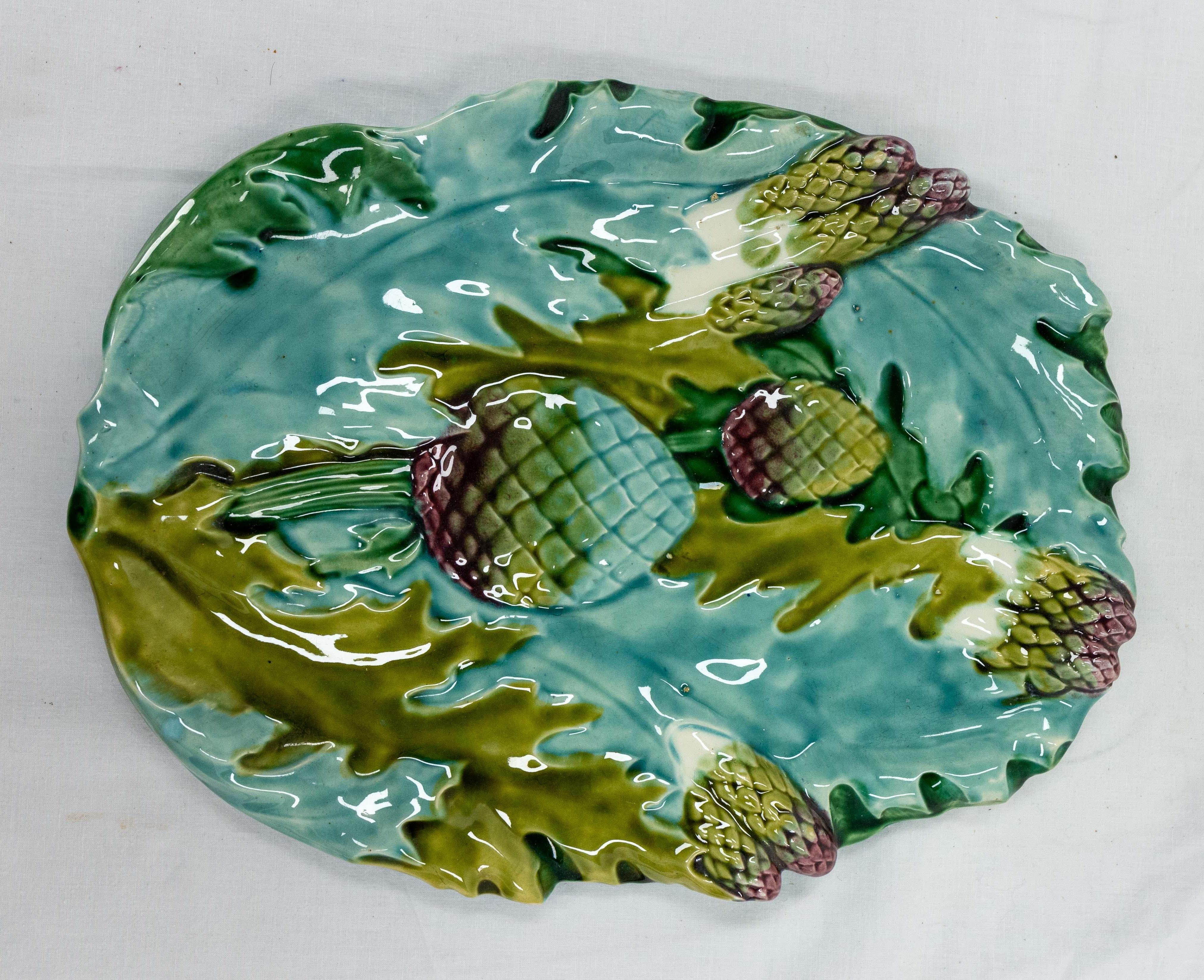Barbotine dish for vegetables: asparagus or artichokes as it is represented or for any other vegetables or use
French art nouveau, circa 1900
Manufacture in Luneville, France
Good condition.

Shipping:
L36 P27 H4,5 1,5 KG.