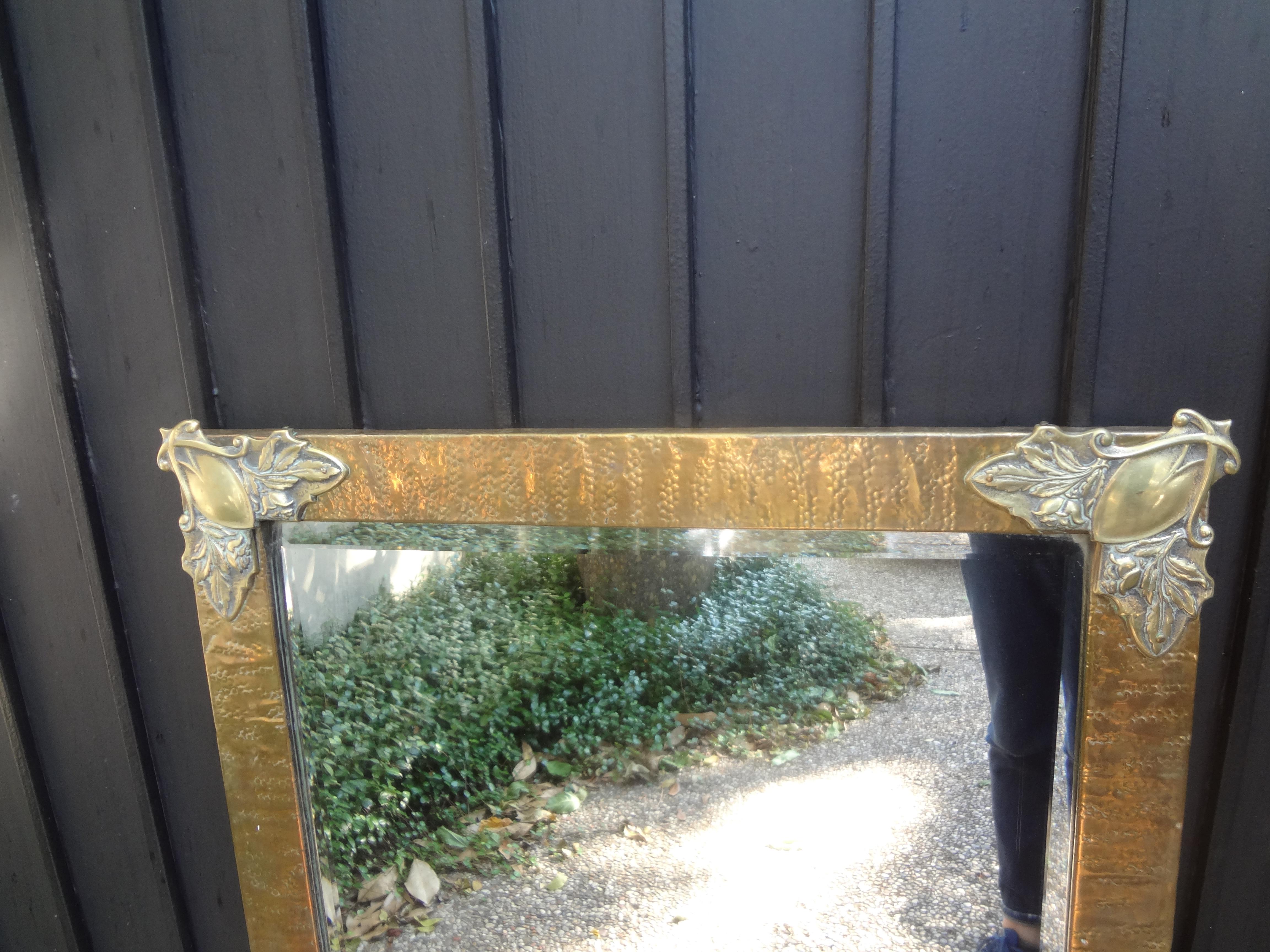 French Art Nouveau Brass Beveled Mirror.
Stunning period French Art Nouveau brass hand hammered beveled mirror with beautifully decorated corner appliques. This lovely beveled mirror can be displayed in either vertically or horizontally. Very well
