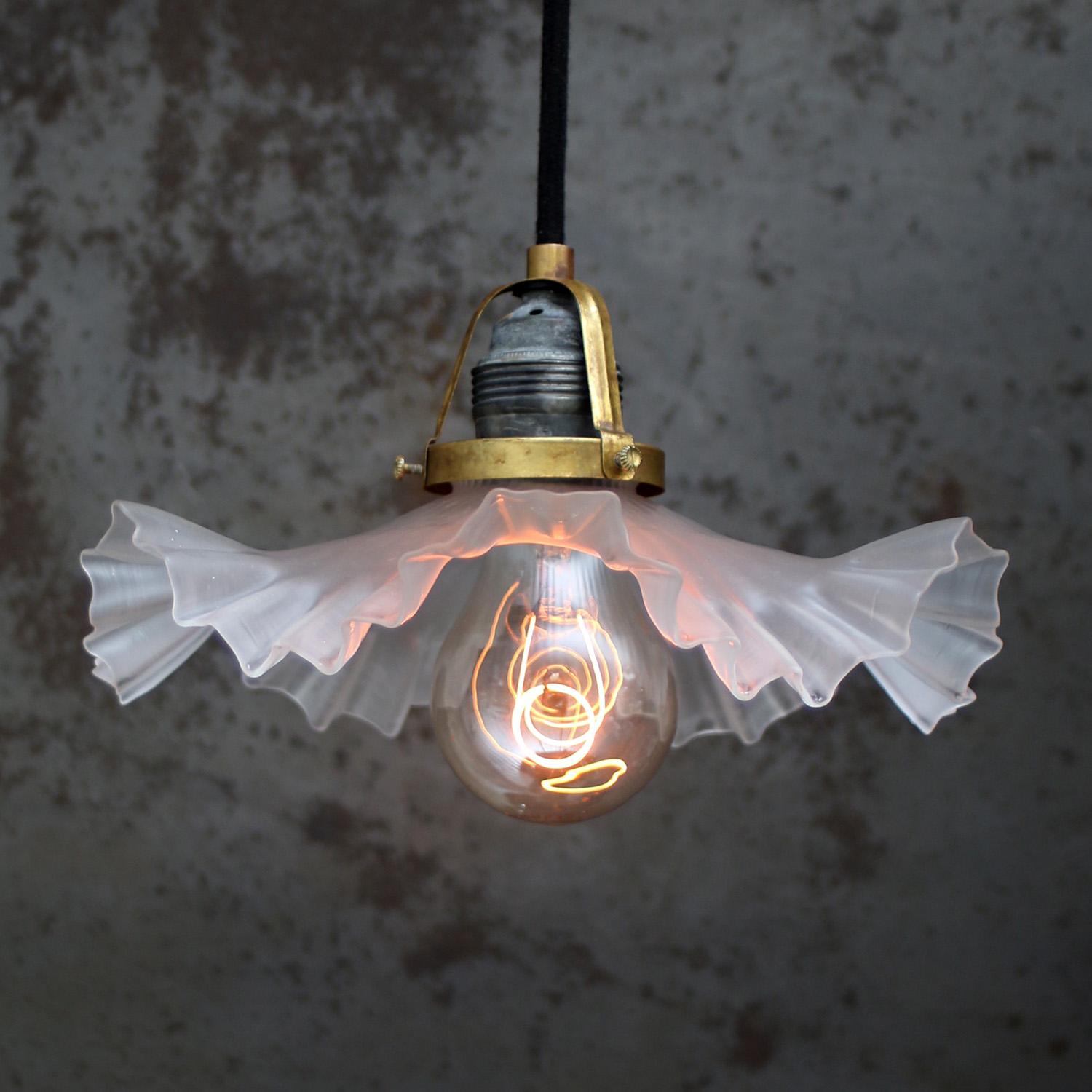 French Art Nouveau glass lamp
Brass bulb holder with mat glass shade.
2 meter / 80 inches black cotton wire.

Weight: 0.30 kg / 0.7 lb

Priced per individual item. All lamps have been made suitable by international standards for incandescent light