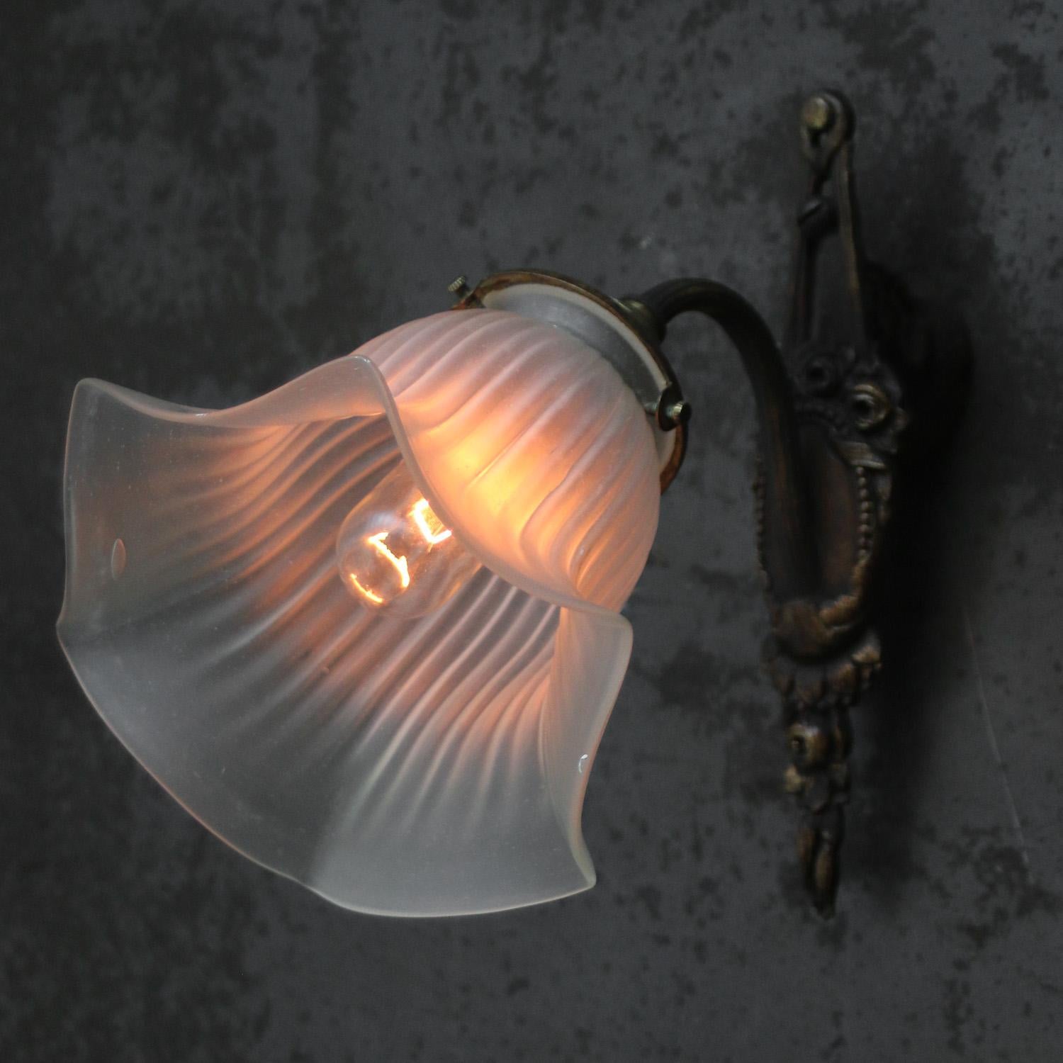 French art nouveau wall lamp
Frosted glass shade with brass wall piece and arm

B22 bulb holder / Bayonet

Weight: 1.00 kg / 2.2 lb

Priced per individual item. All lamps have been made suitable by international standards for incandescent light