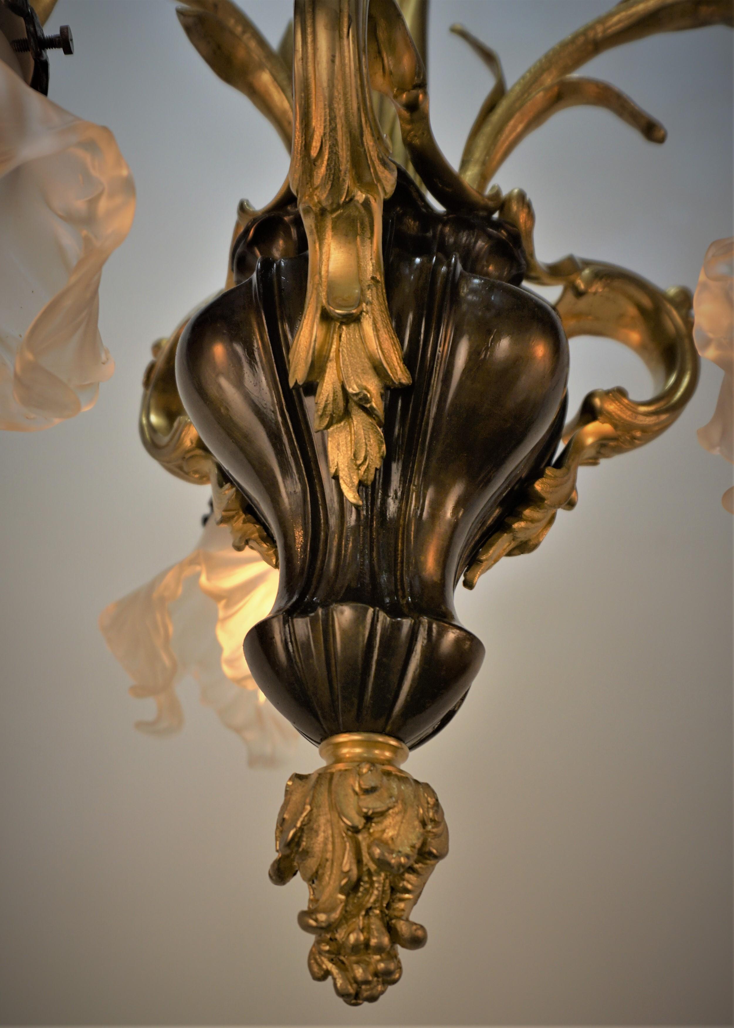 Early 20th Century French Art Nouveau Bronze Chandelier with Blown Glass Shades For Sale