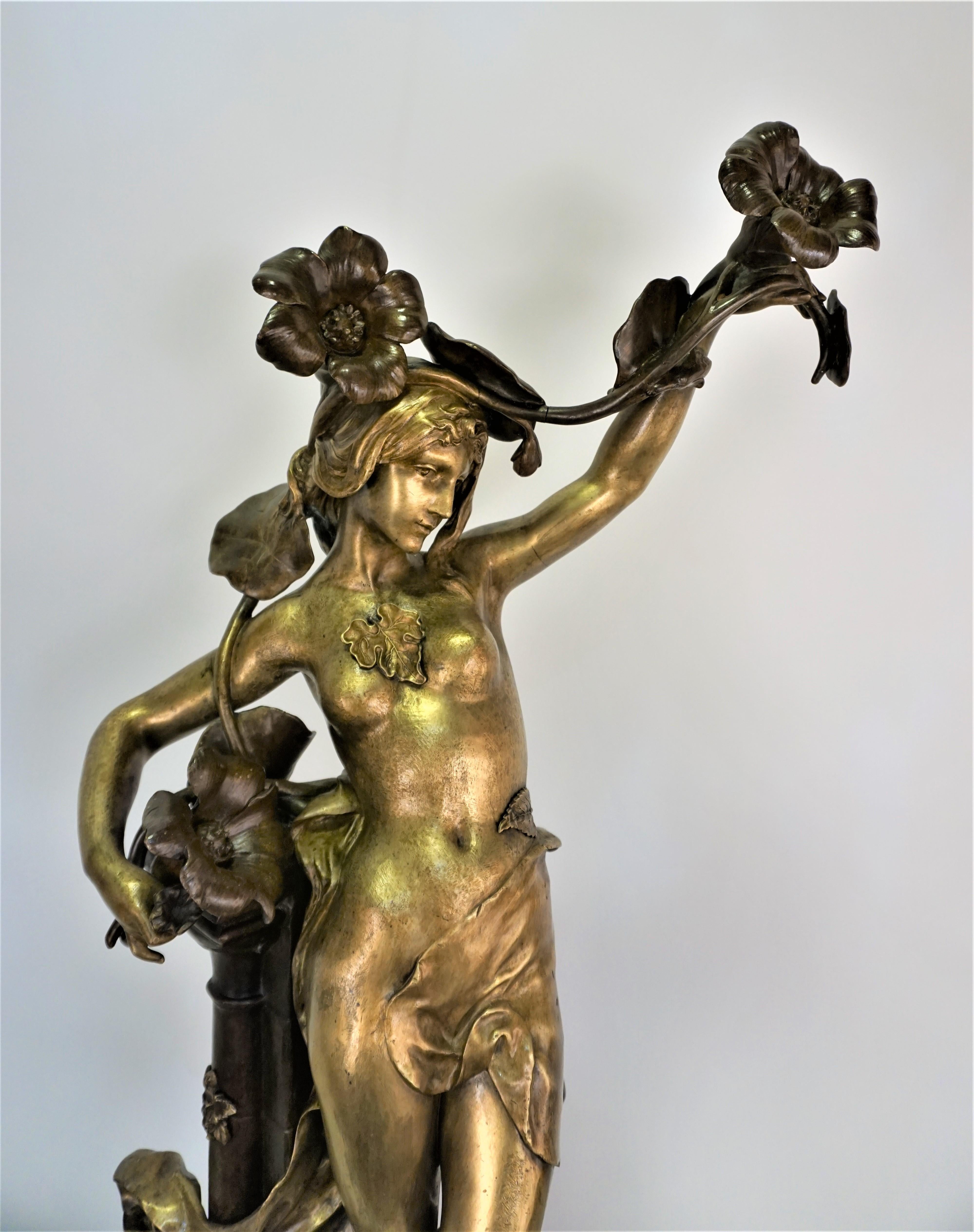 Art Nouveau nude bronze sculpture, circa 1890 has been finished in textured golden and brown- black color.