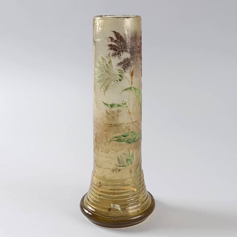 A French Art Nouveau cameo glass vase by Émile Gallé. The carved blooming flowers are painted in reds and whites, with green accents. Some of the carved stems are also painted, in reds and greens, circa 1900.

Signed, 