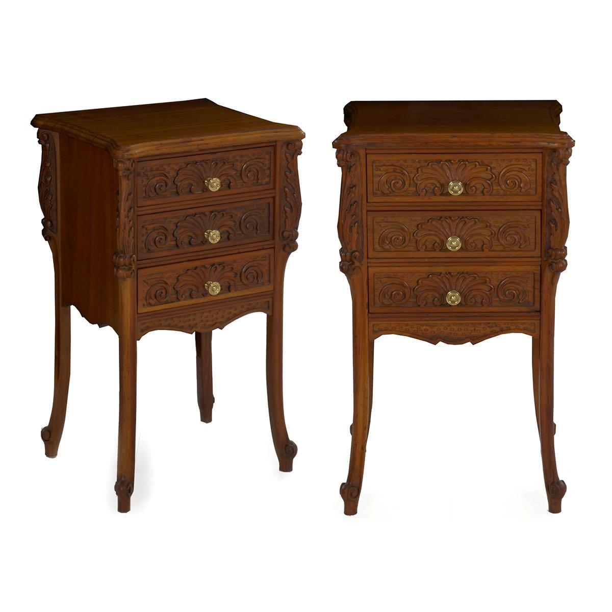 Pair of Art Nouveau carved walnut nightstand tables,
France, circa early 20th century
Item # 007ZFY30

A fantastic matched pair of early 20th century nightstand tables, each is crafted out of dense walnut solid primary woods and feature a