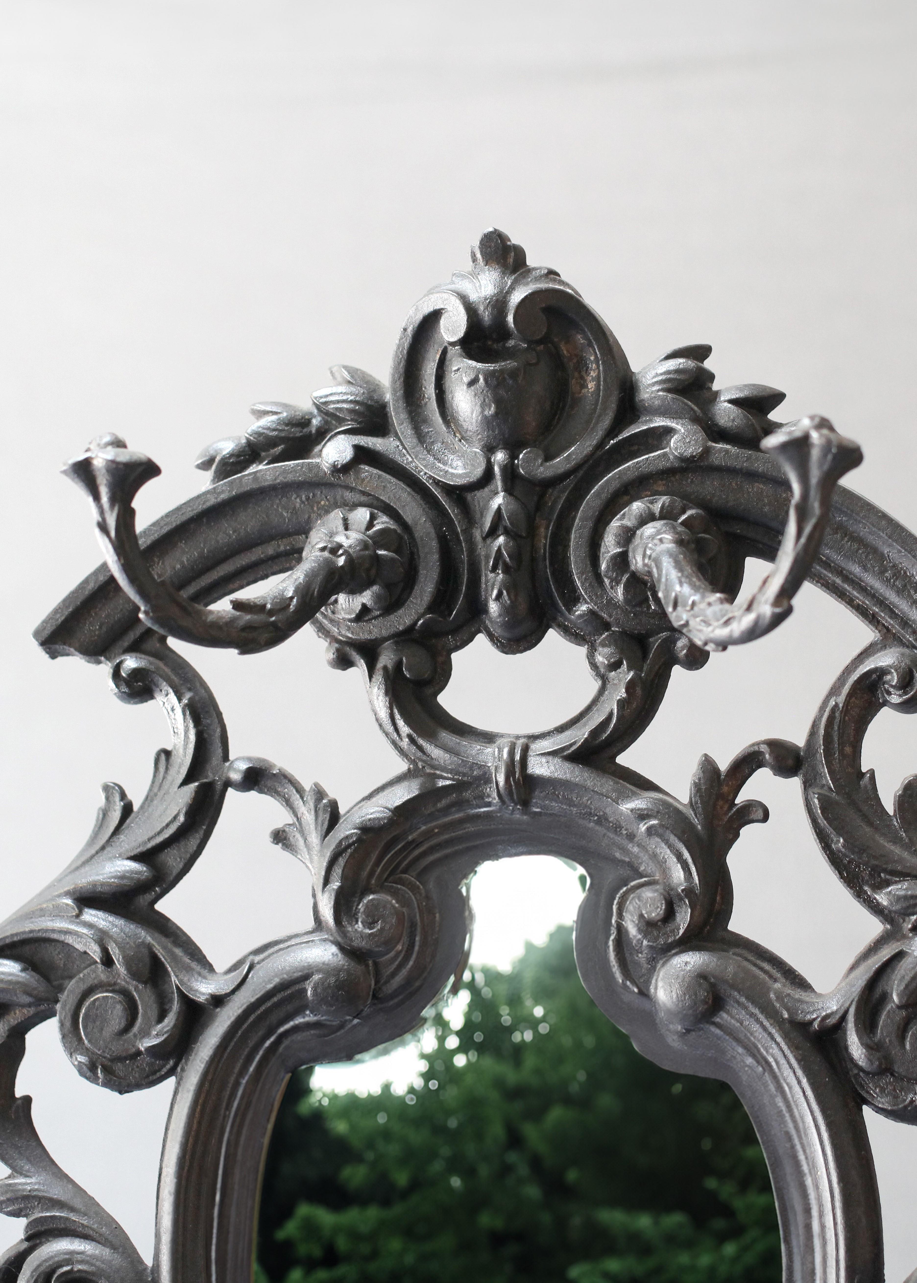 Emanating the spirit of the Art Nouveau movement, this French Cast Iron Hall Tree by Alfred Corneau is a captivating artifact from the turn of the 20th century. Expertly shaped with decorative details, the Hall Tree features an elegant mirror plate