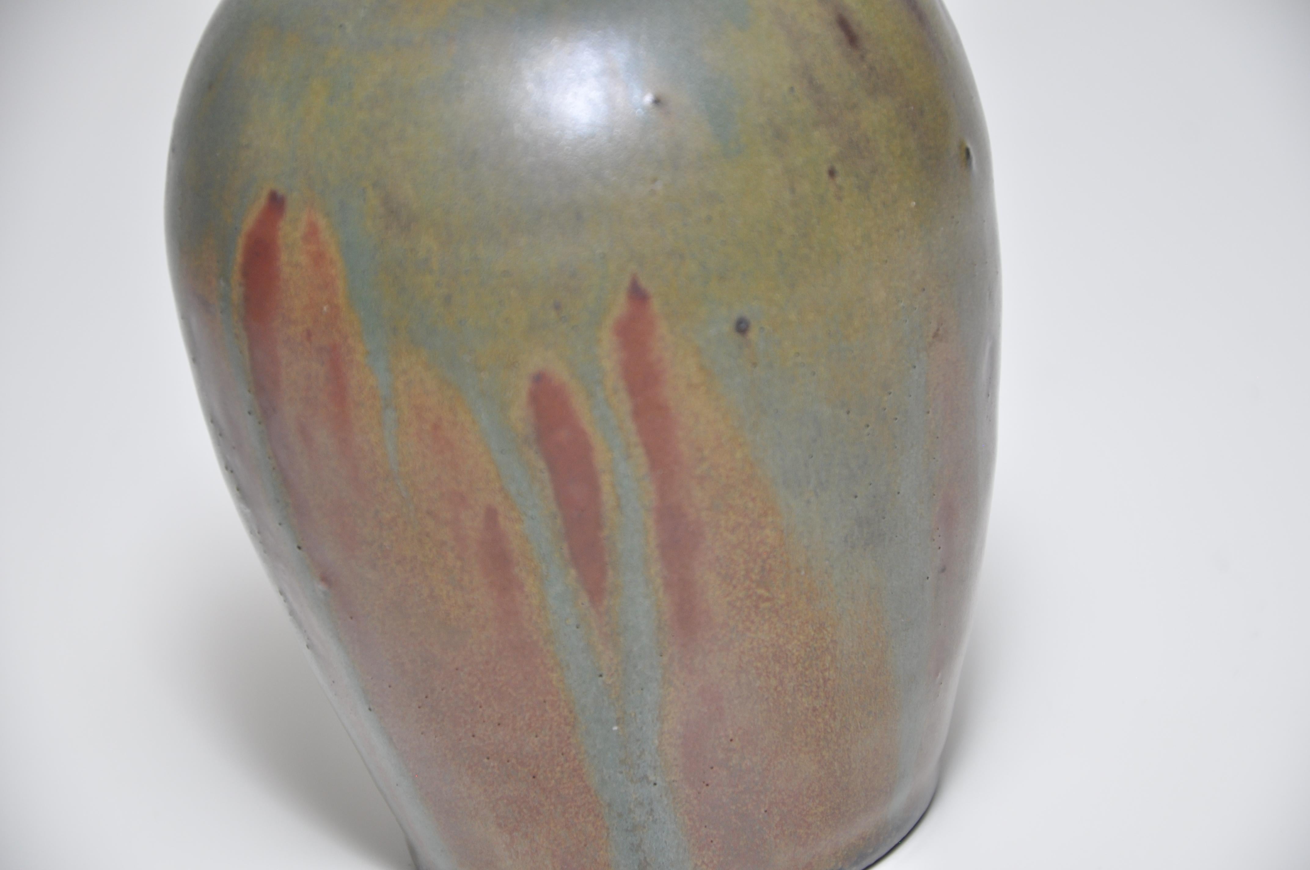 French Art Nouveau ceramic vase, of ovoid form with narrow neck, covered with flowing dark green and brown glaze of Japanese inspiration.
A very nice and subtle piece.
With the incised signature of Lucien Arnaud, a close friend of celebrated Jean