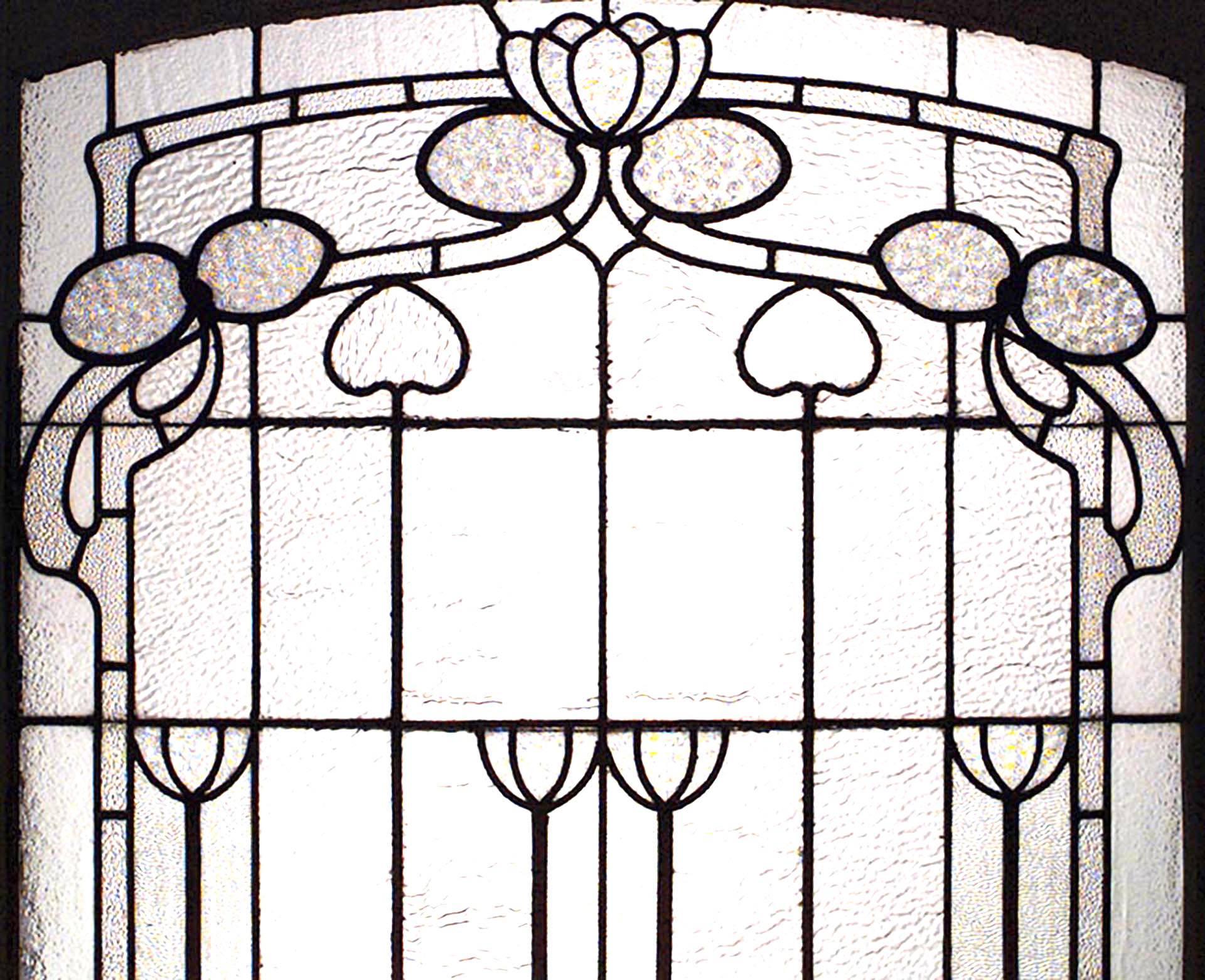 French Art Nouveau clear and textured leaded glass double hung (2 section) window.
 