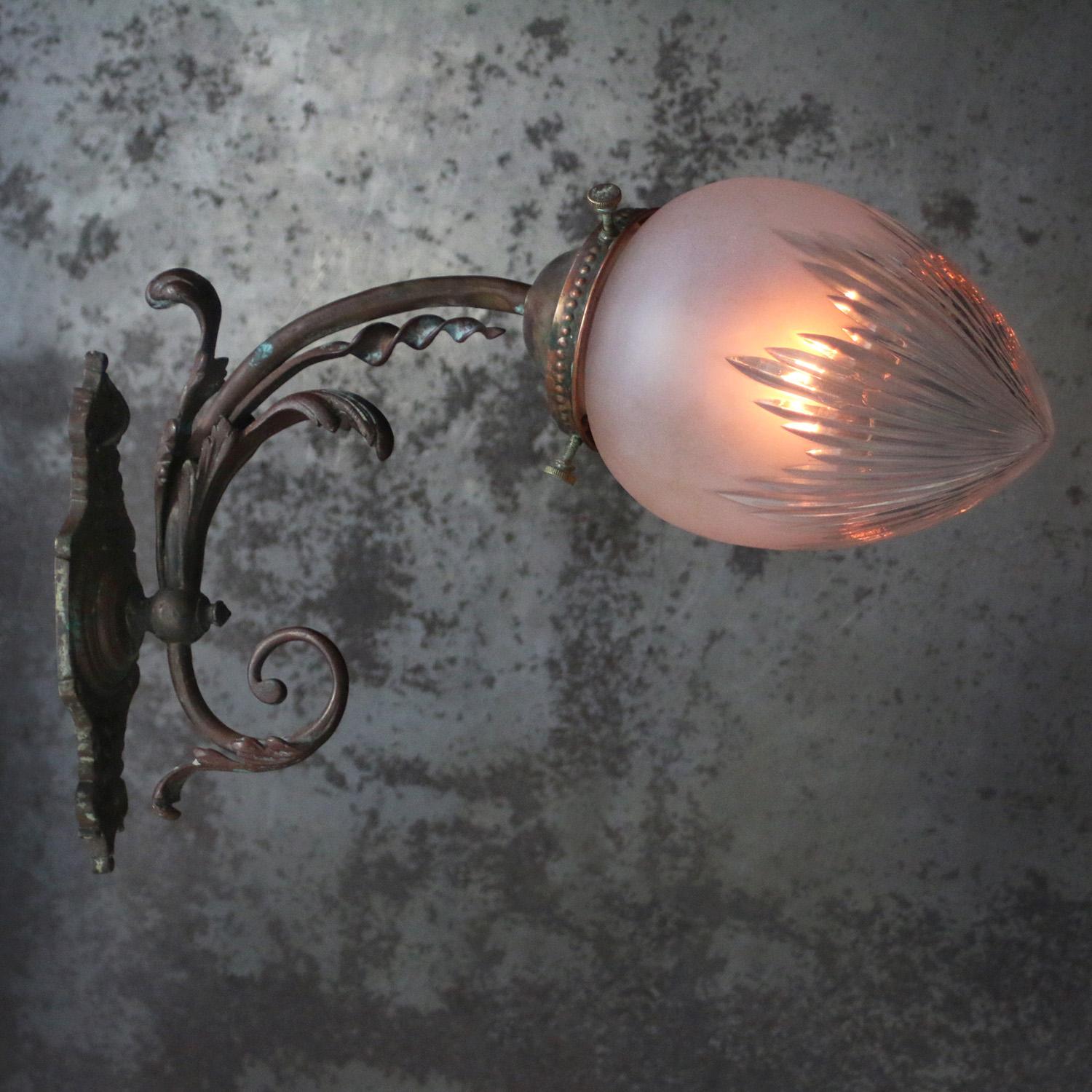 French art nouveau wall lamp
Semi frosted cut glass shade
Copper wall piece and brass arm

Weight: 1.70 kg / 3.7 lb

Priced per individual item. All lamps have been made suitable by international standards for incandescent light bulbs,