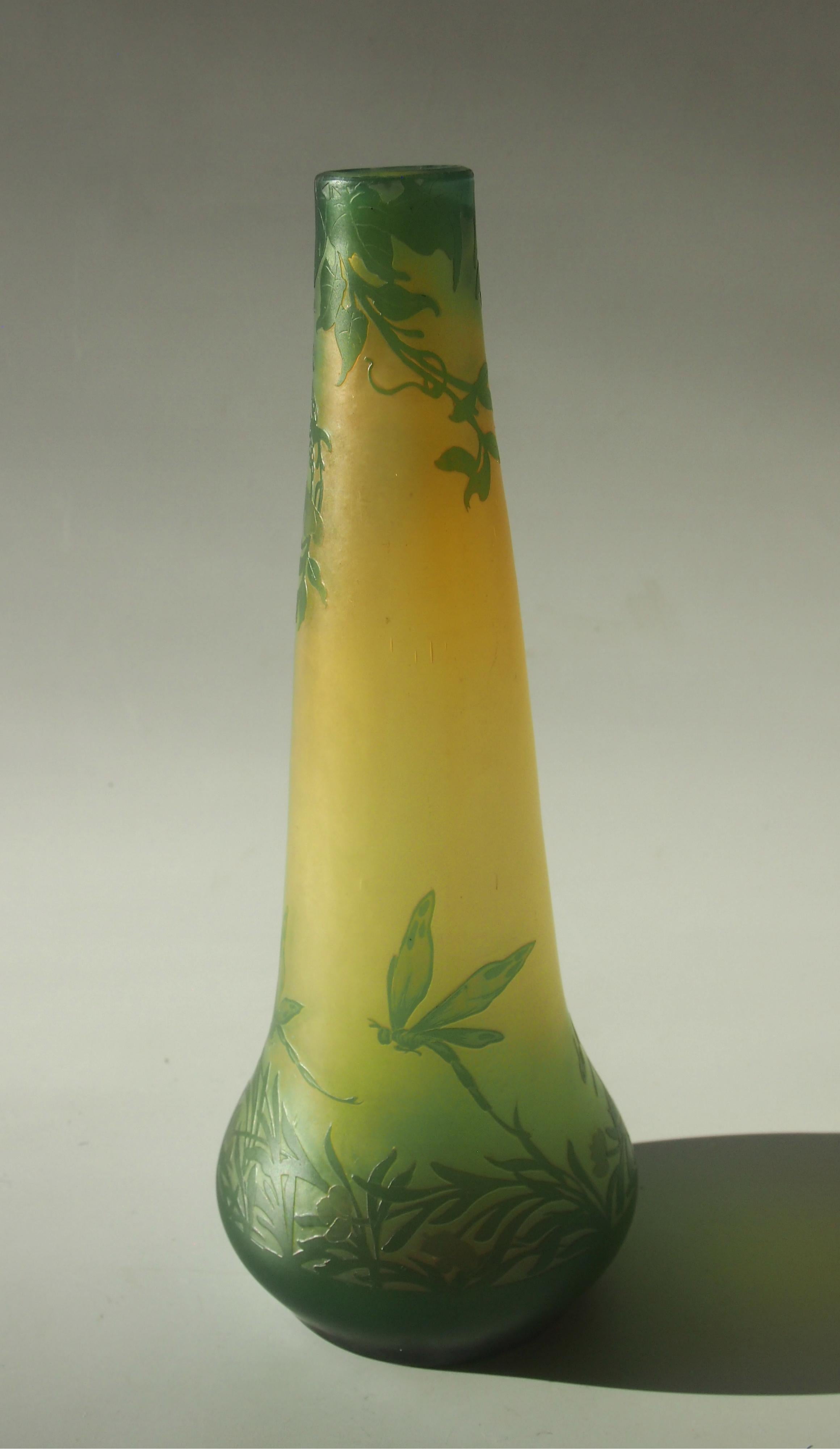 Superb French Art Nouveau green, yellow and peach cameo glass vase by Cristallerie De Pantin depicting flowers and dragonflies. Nicely signed Devez in cameo see image 3

Pantin was one of the great Paris based glass works, they signed most of