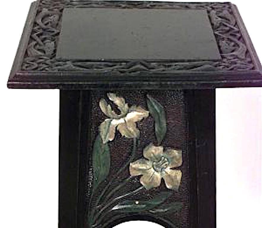 French Art Nouveau ebonized pedestal with floral design and square fretwork top.
