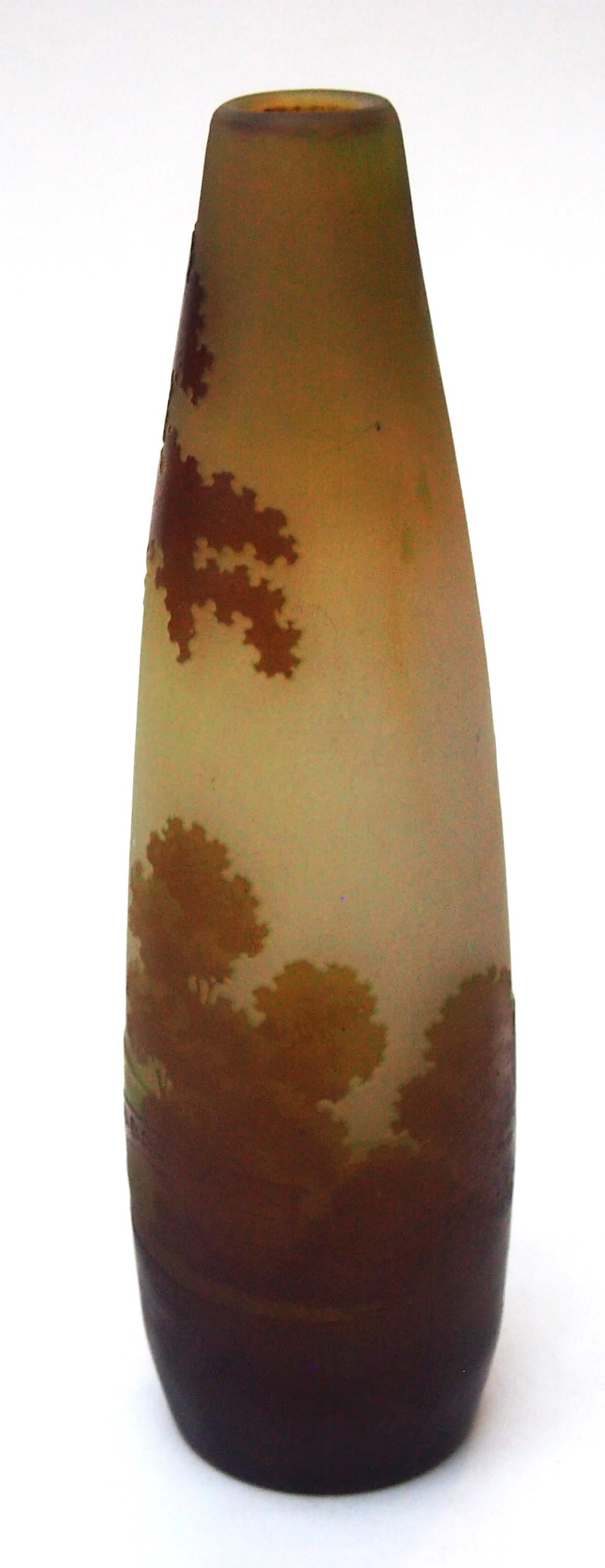 Exceptionally rare Emile Galle cameo vase in greens and browns over yellow depicting a man crossing a metal and stone bridge -one of the rarest images. The first Galle landscapes were made c 1908 and depicted many images swiftly banned by Galle's