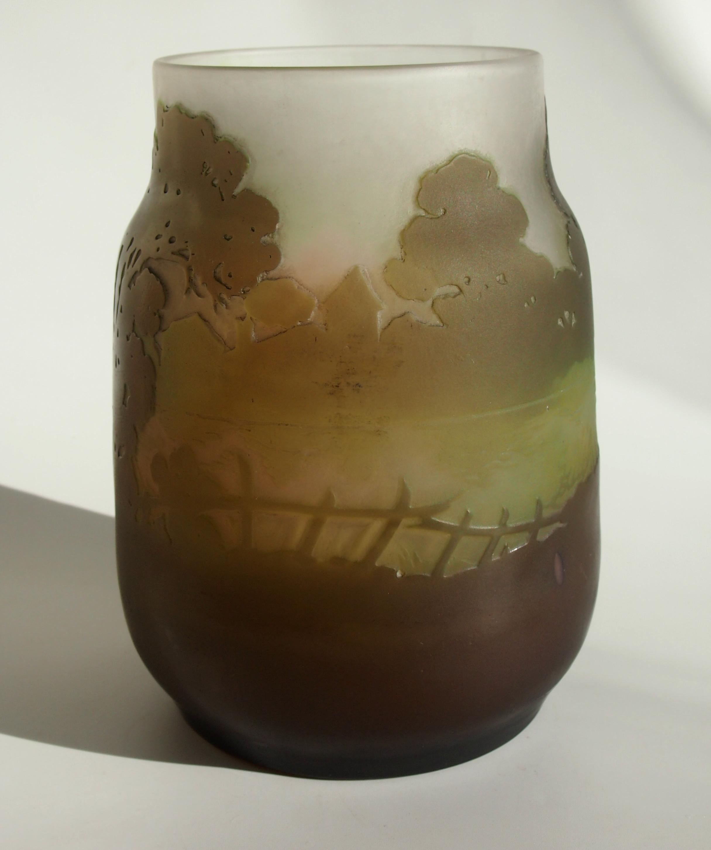 Exceptional Art Nouveau Emile Galle Cameo landscape vase, depicting a very early morning waterside scene, with outline trees, buildings and shrubs, with swirling mists over a flowing river and little ramshackle fences. Signed in cameo c 1910