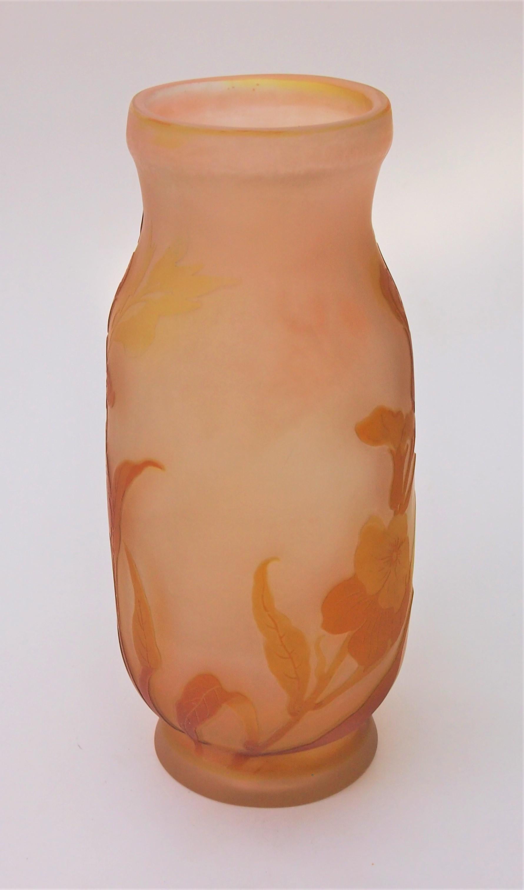 Super early Emile Galle three colour cameo vase in the unusual combination of orange and yellow and pink featuring unusual wild flowers in bloom with a great early signature circa 1899 -see picture 5 

Emile Galle was probably the greatest glass