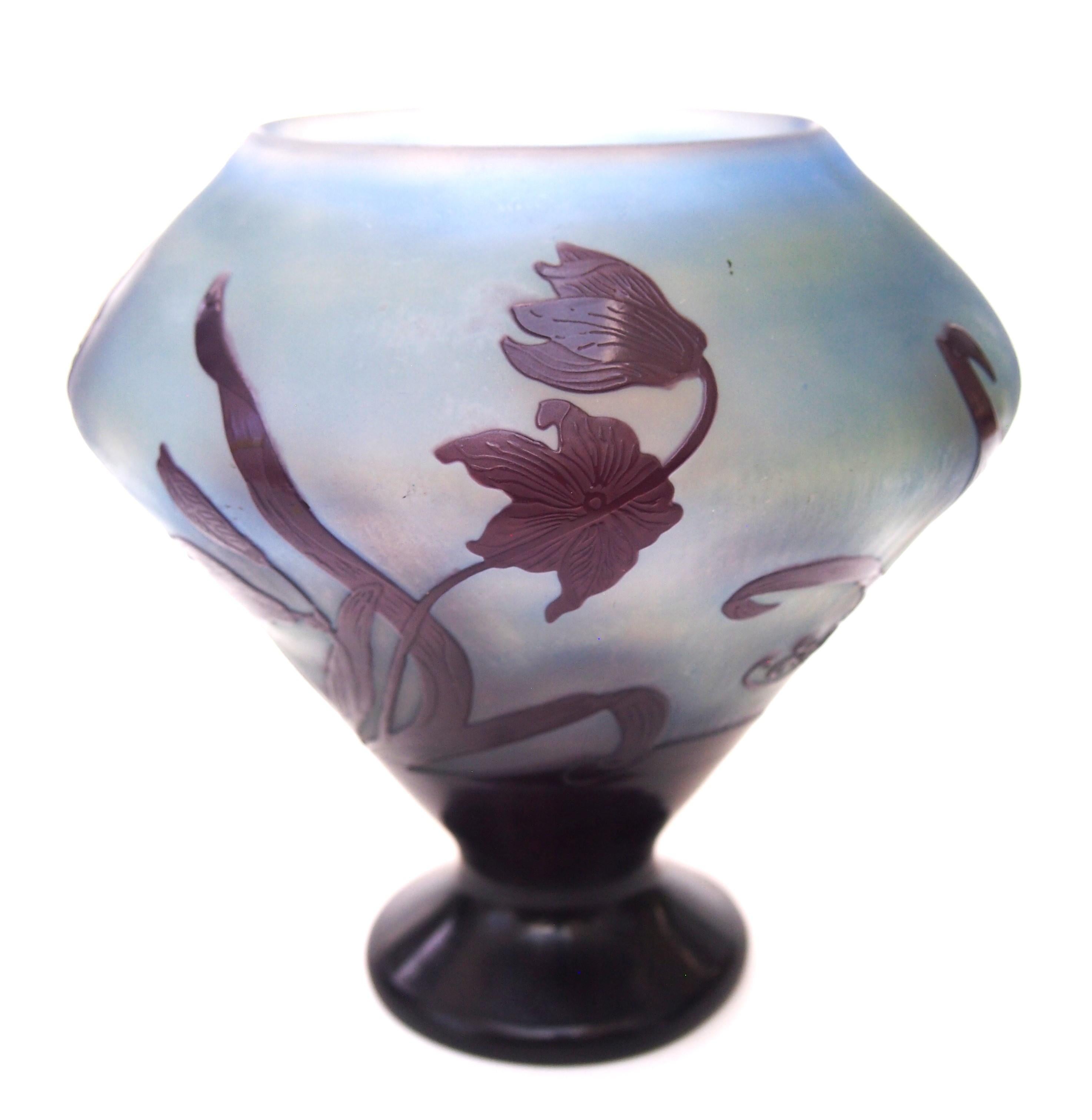 Fabulous medium small Emile Galle Cameo glass vase footed and widely flared and turned in top -A classic Galle shape - It is in a very dramatic and effective colourway - Purple and blue over orange, giving a hint of green and a sunny afterglow - It
