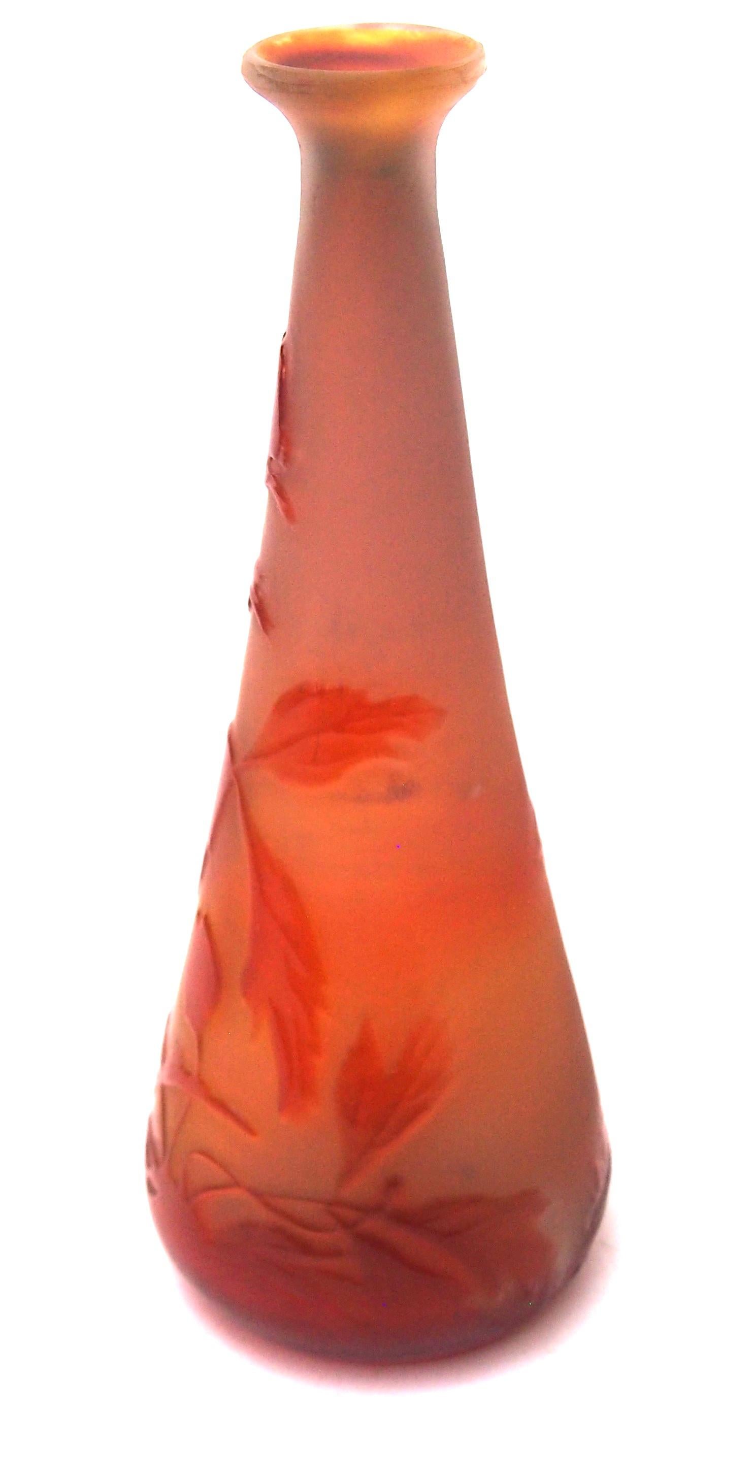 Particularly pretty small Emile Galle Cameo glass vase in a tall thin cone shape with flared lip - Orange over yellow and partly fire polished depicting quite striking flowering wild flowers with spikey leaves -Alas we are not quite sure what the