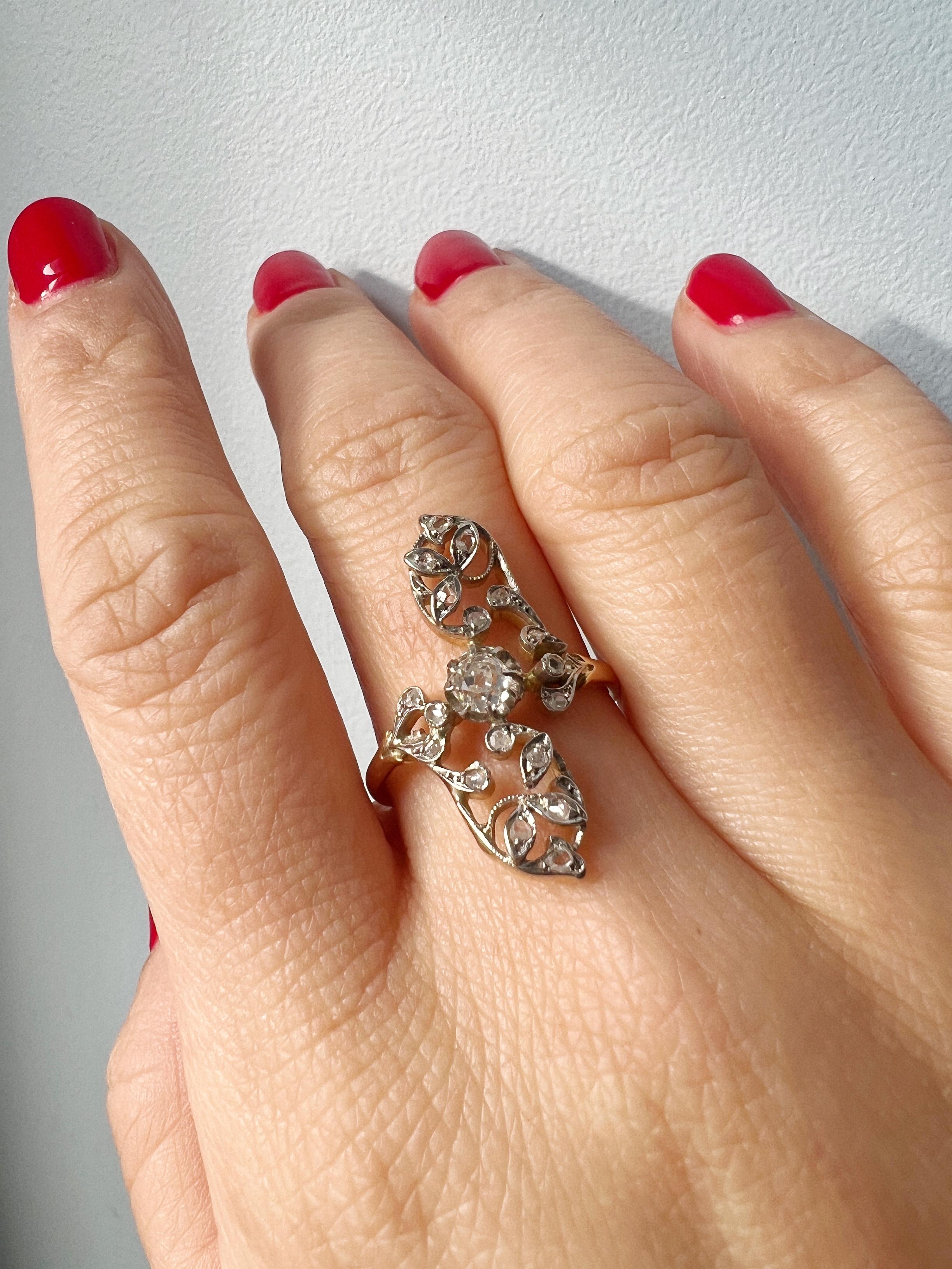 As the first spring bulbs start to make their appearance, it is the perfect time to wear your spring vibe jewelry!

For sale a beautiful 18K marquise ring featuring a floral head with flowing lines and leaves.

The central of the motif is made of an