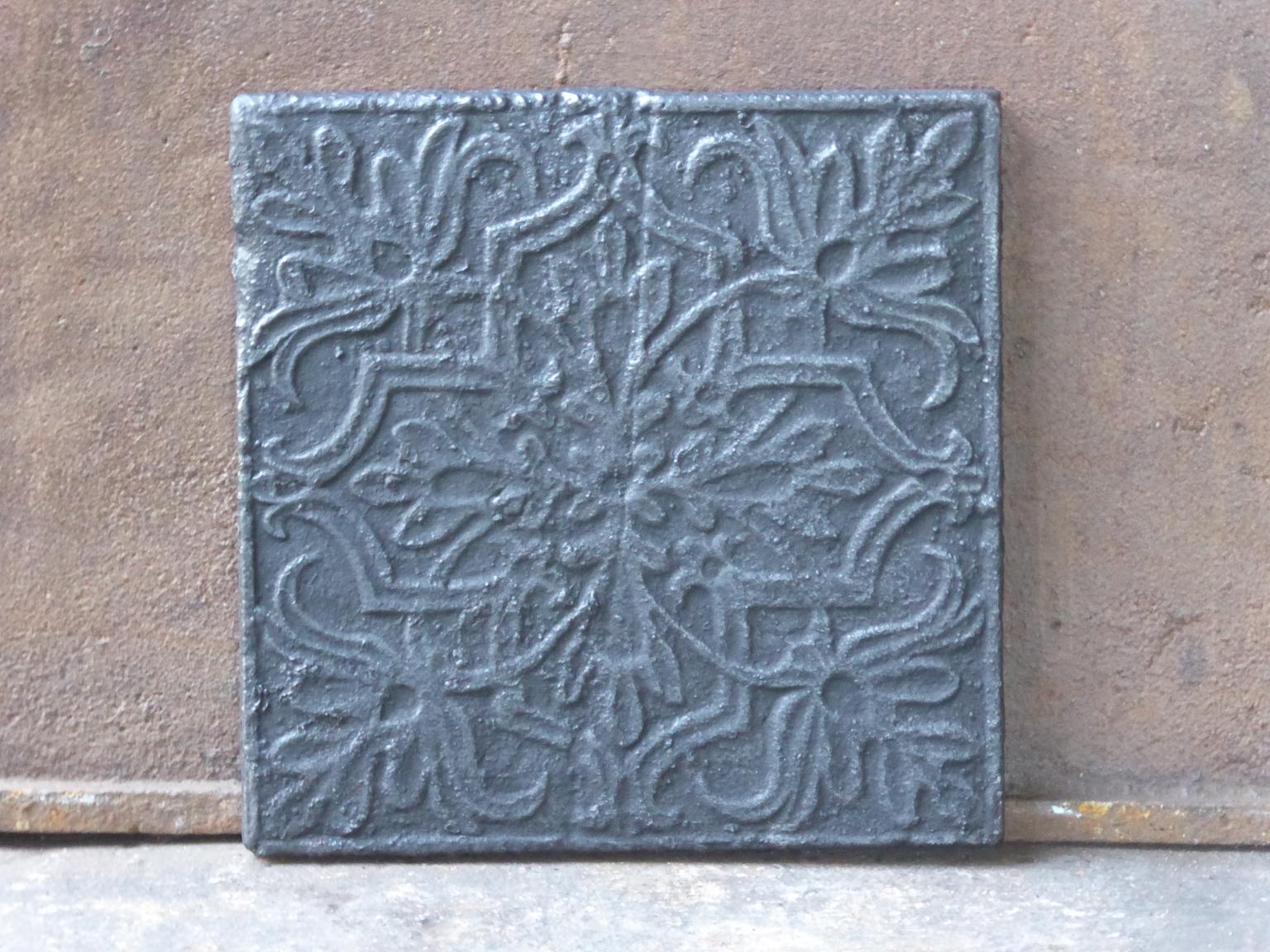 Late 19th-early 20th century French Art Nouveau fireback. The fireback is made of cast iron. The patina is black.