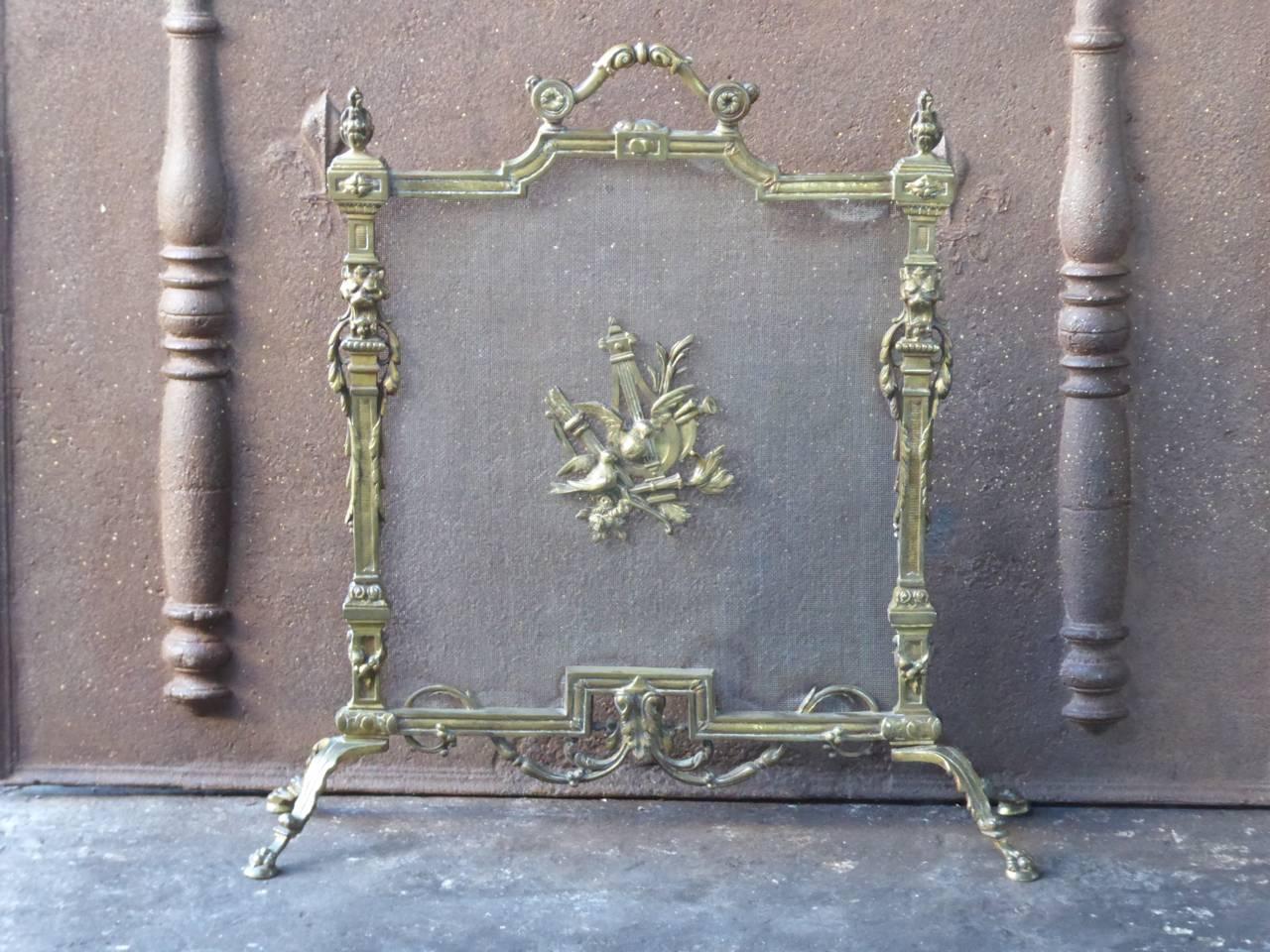 French Art Nouveau fireplace screen made of brass and iron mesh.

We have a unique and specialized collection of antique and used fireplace accessories consisting of more than 1000 listings at 1stdibs. Amongst others, we always have 300+ firebacks,