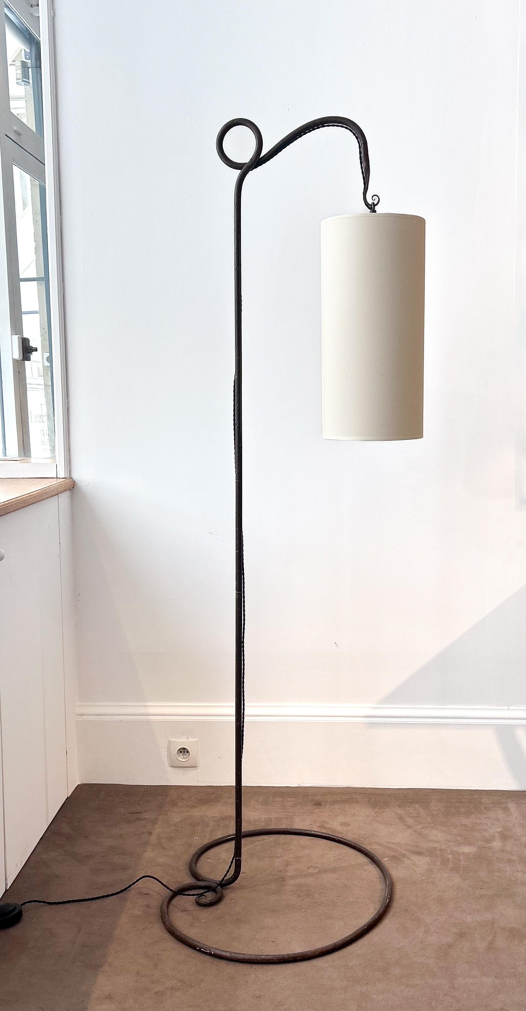 An extremely unique French floor lamp made of wrought iron. 

This piece was made circa 1915 and represents a twisted serpent. 

Both elegant and whimsical. 