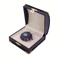 French Art Nouveau flower-shaped brooch, silver, blue enamel and turquoise