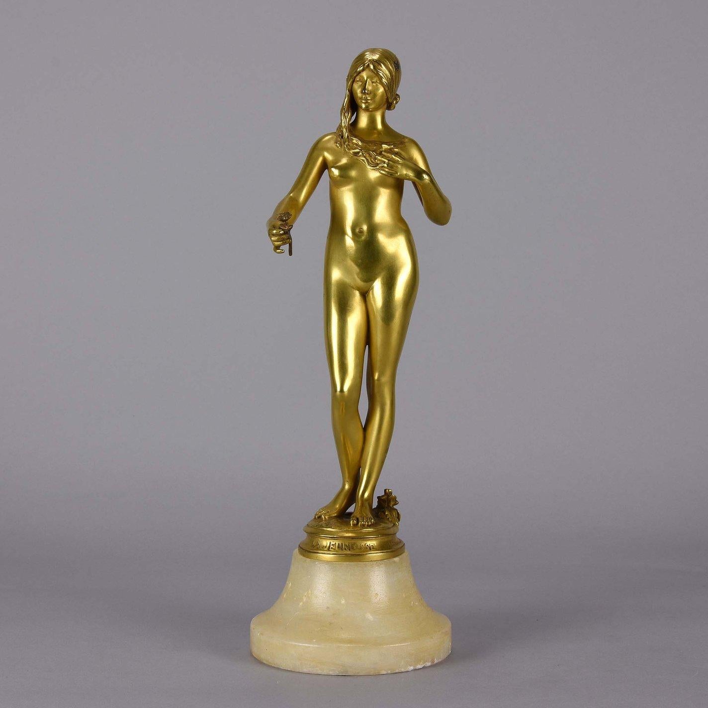 A delightful Art Nouveau early 20th century gilt bronze figure of a very beautiful naked lady, the surface of the bronze exhibiting excellent detail and finish. Raised on a shaped onyx base, inscribed with foundry mark Siot Fondeur Paris and signed
