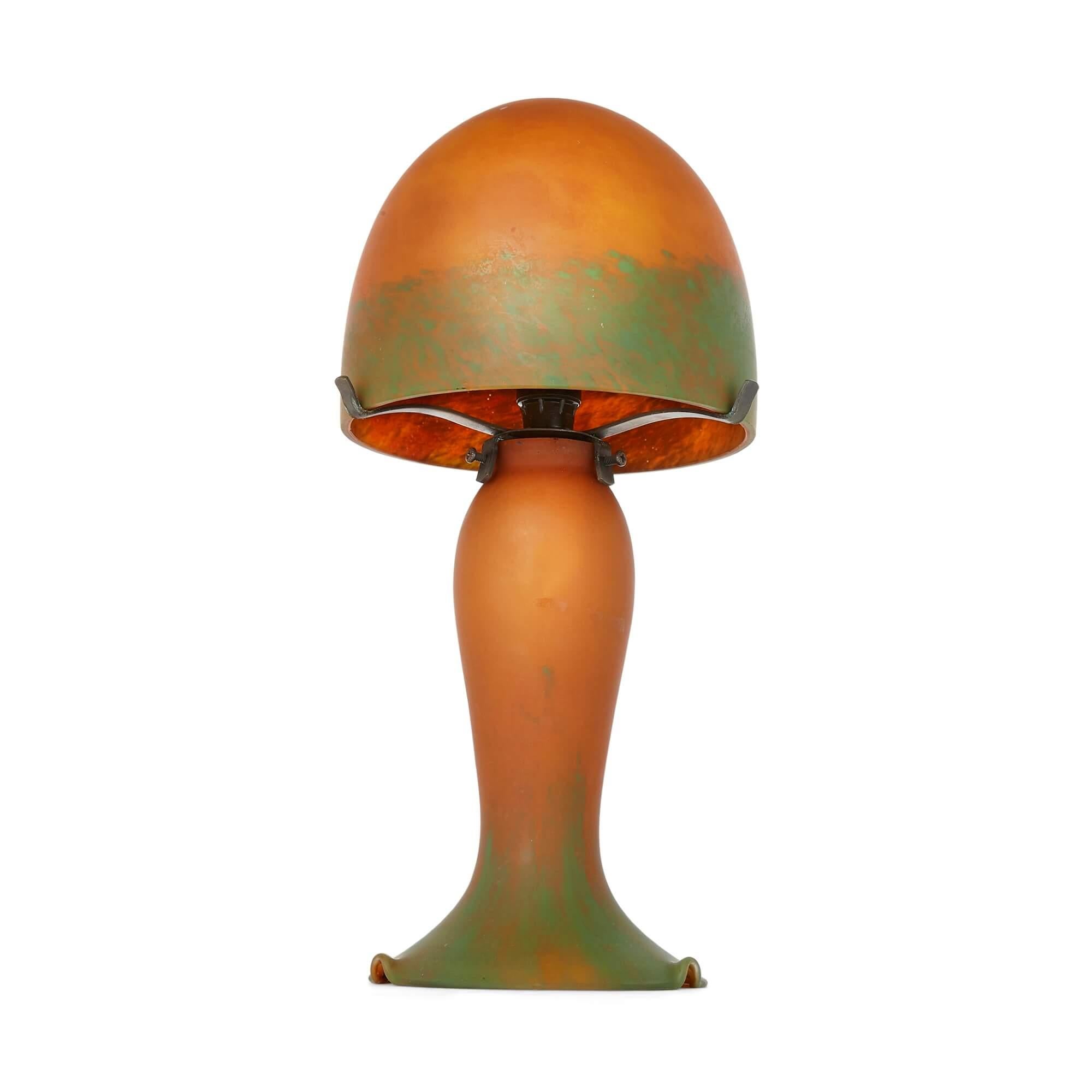 French Art Nouveau glass lamp attributed to Daum
French, c. 1900
Measures: Height 38cm, diameter 18cm

The desire of the Art Nouveau artists to emulate natural forms is brought out brilliantly in this mushroom-shaped lamp. The lamp's design has