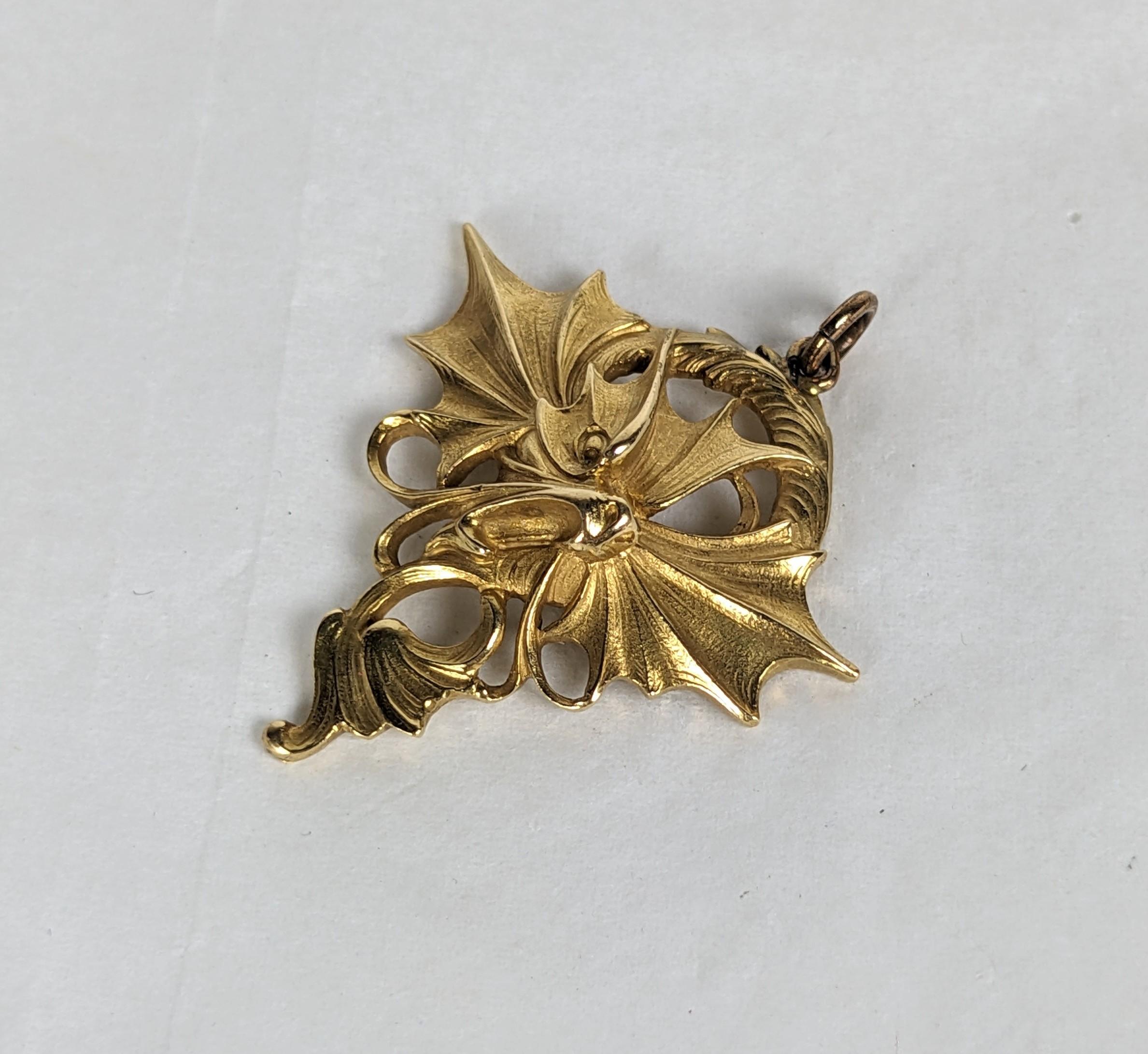 Wonderful French Art Nouveau Gold Gargoyle or Dragon-Fish Pendant in 18k gold circa 1900. Marked with eagle hallmark for 18k gold and Depose. Wonderful hand hammered matte gold detailing front and back, 1.25