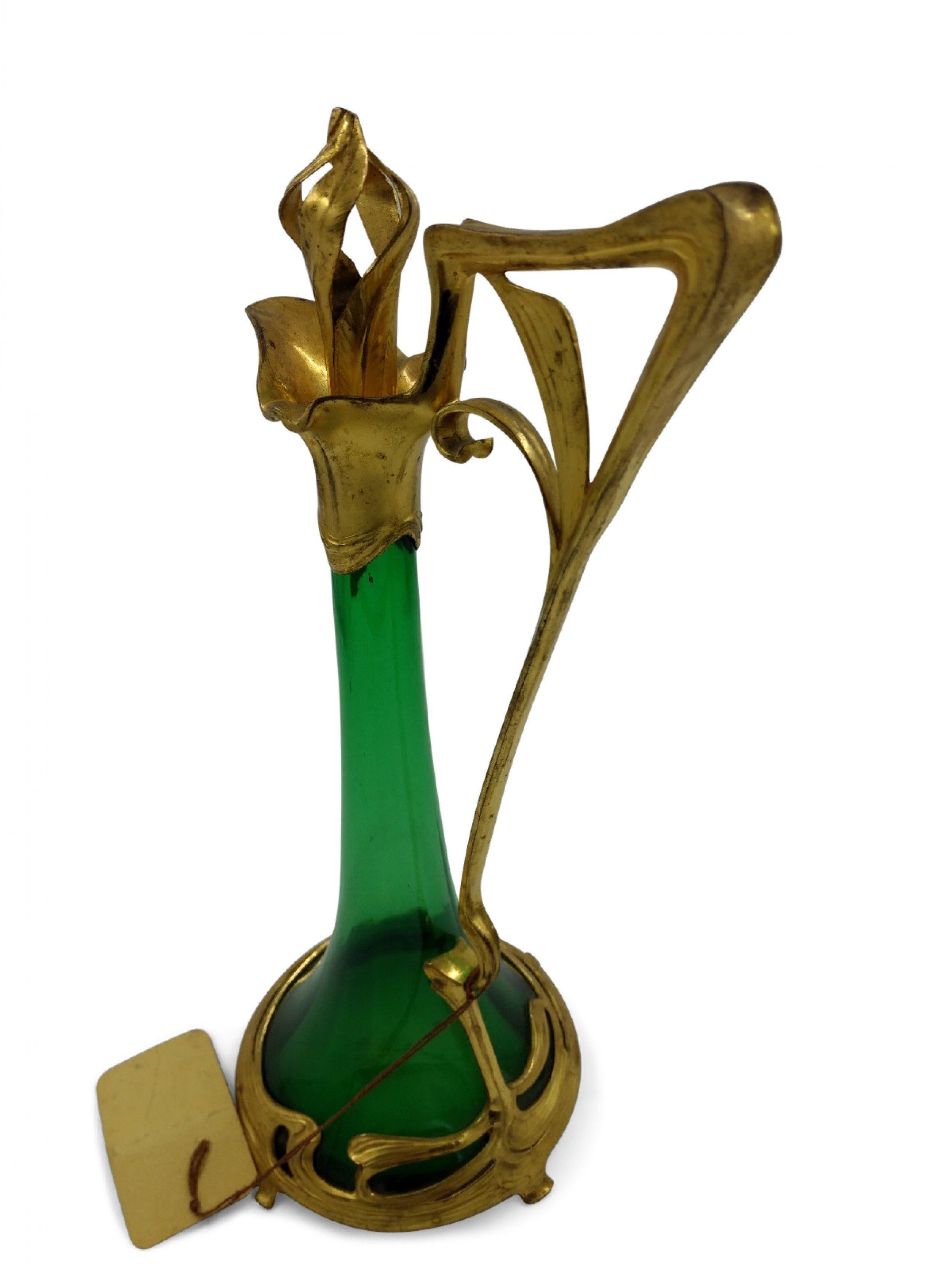 French Art Nouveau green glass decanter with bronze dore trim.