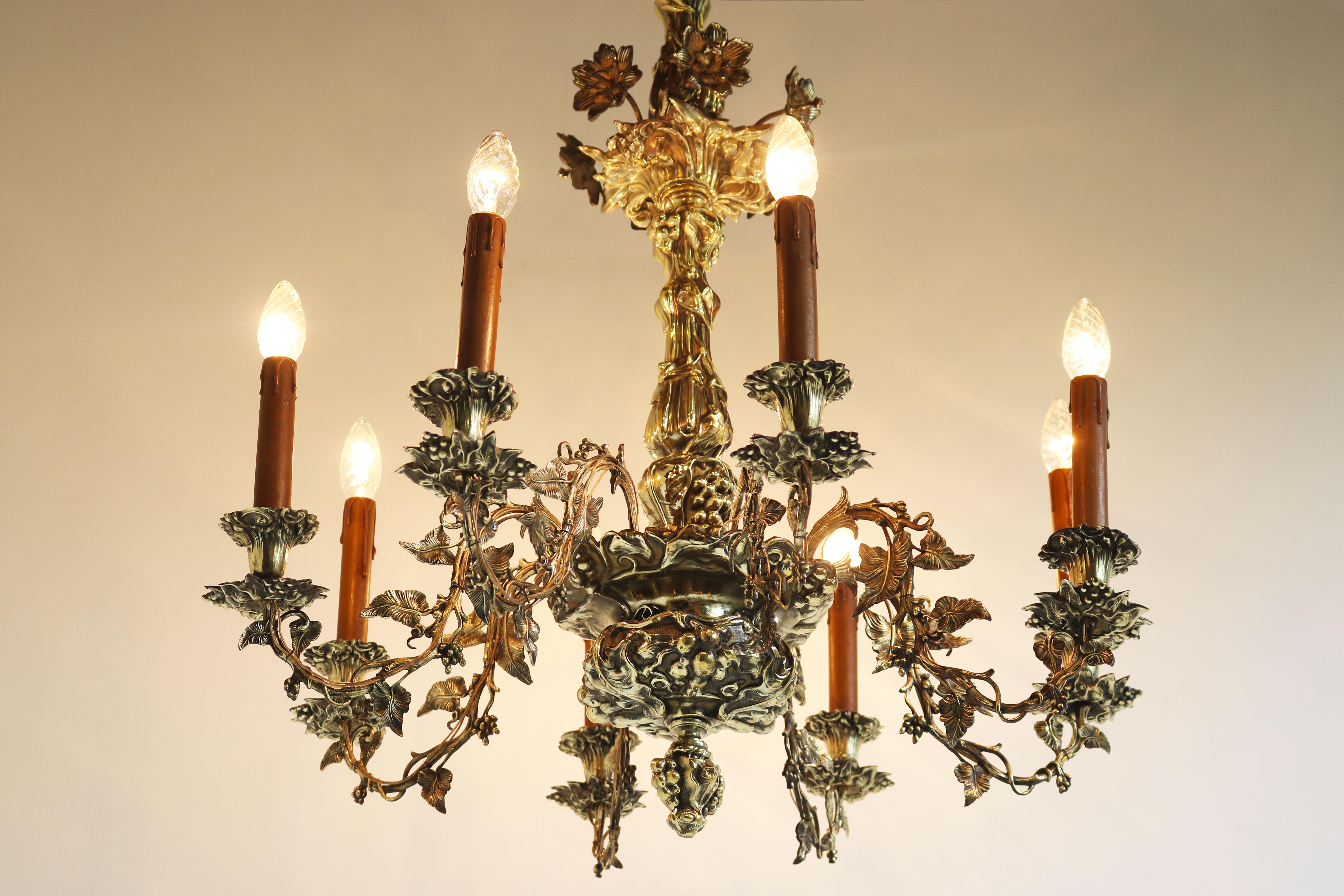 Breathtaking & exceptional! This French Art Nouveau chandelier made out of solid brass & hammered brass done fully by hand.
Originally made for candles and later in its life converted to electricity made in the 1890s at the start of the art nouveau
