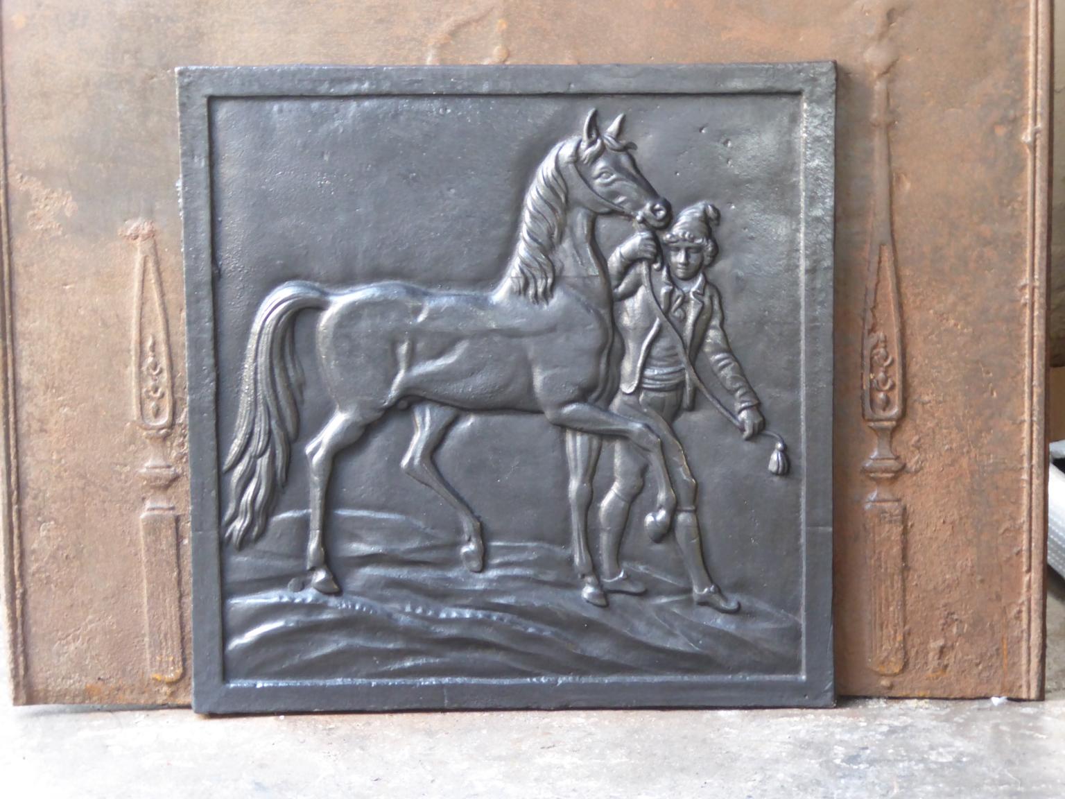 20th century French Art Nouveau fireback with a horse.

The fireback is made of cast iron. The patina is black / pewter. The fireback is in a good condition and does not have any cracks.