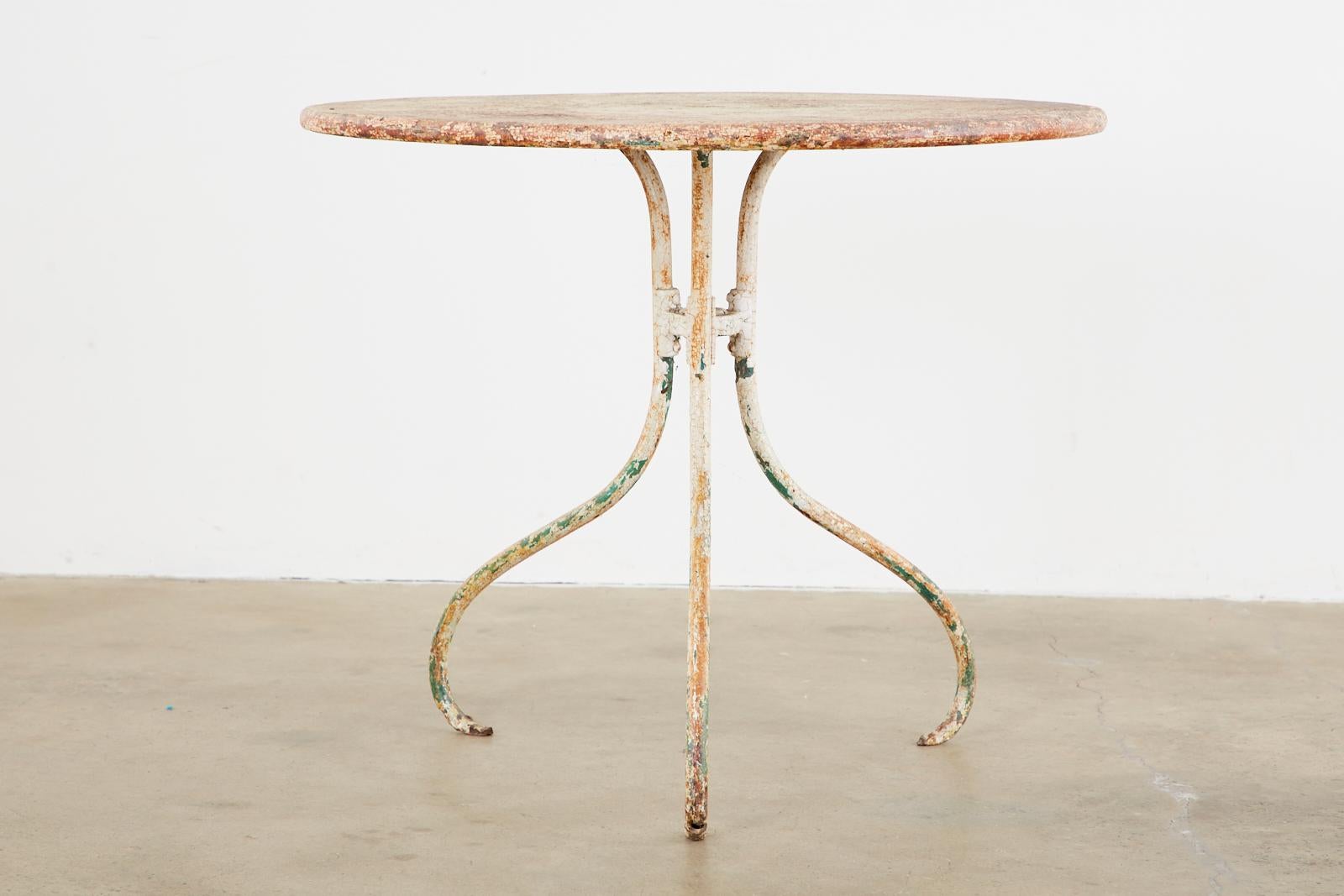 French Art Nouveau Iron Bistro Garden Dining Table In Distressed Condition In Rio Vista, CA