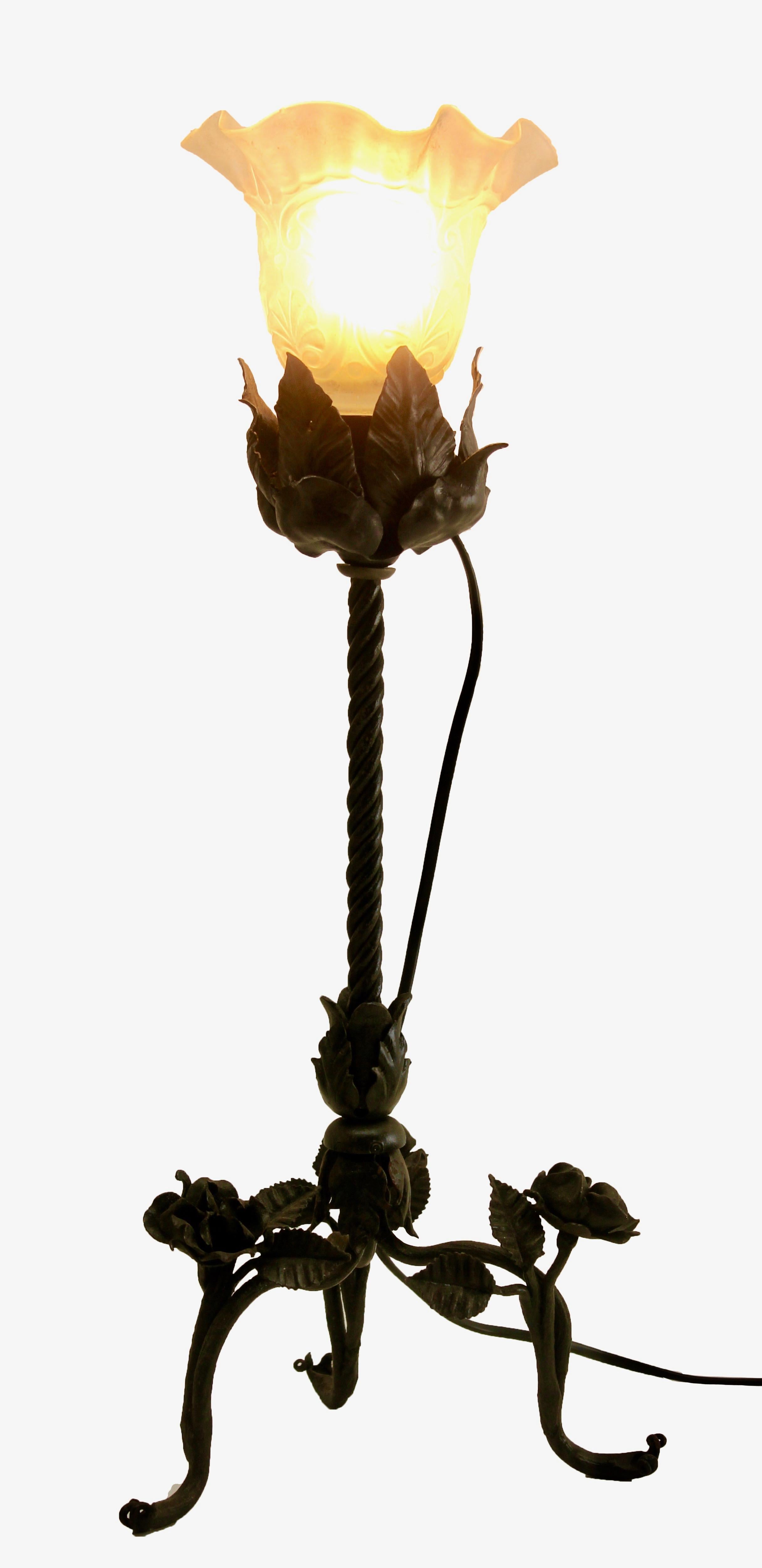 1910s-1920s, France
A wonderful of French Art Nouveau lamp. The stands are handmade in wrought iron with black finish patina and hammered with floral pattern. The metalwork is of excellent quality.
Crowned with bright shade in opalline glass.
In