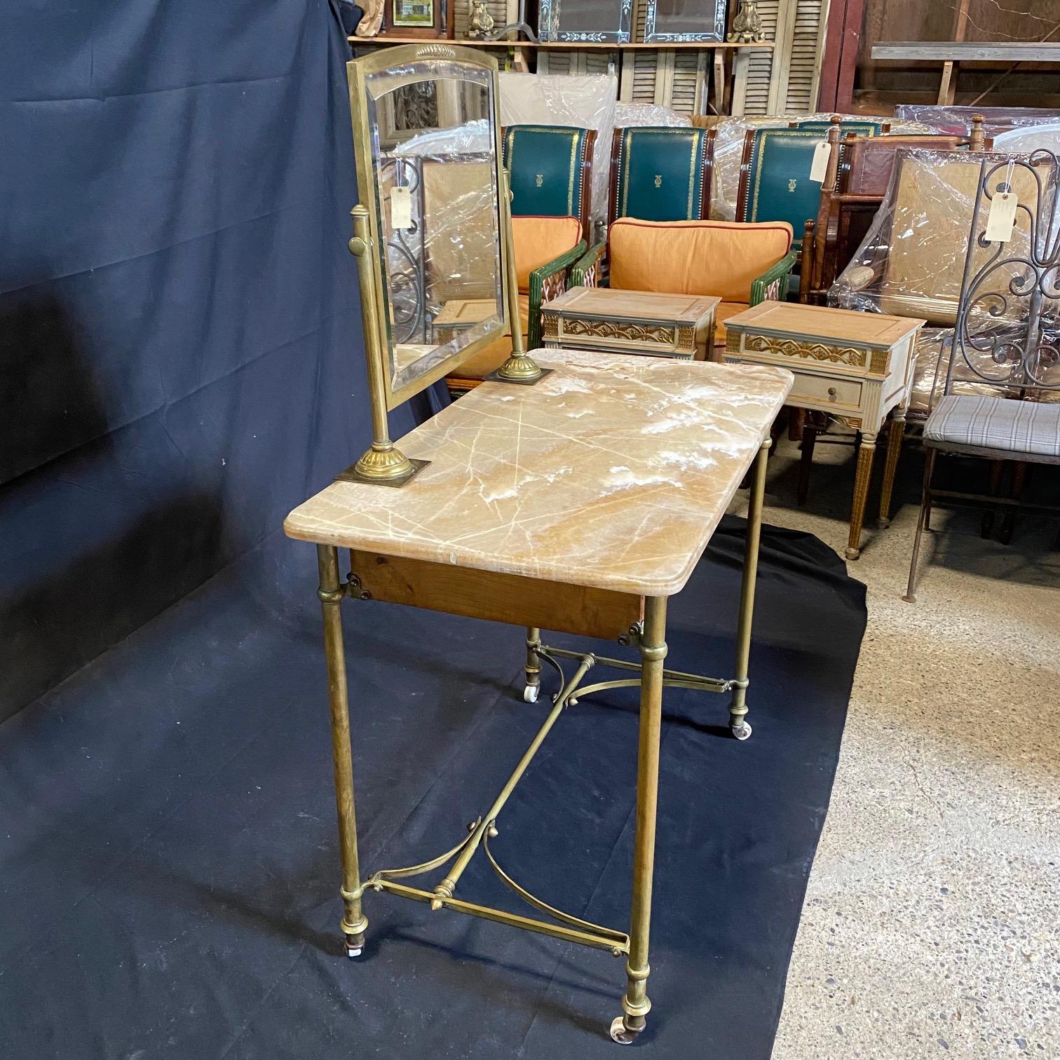 Early 20th Century French Art Nouveau Marble Top Dressing Table with Beveled Mirror and Brass Legs