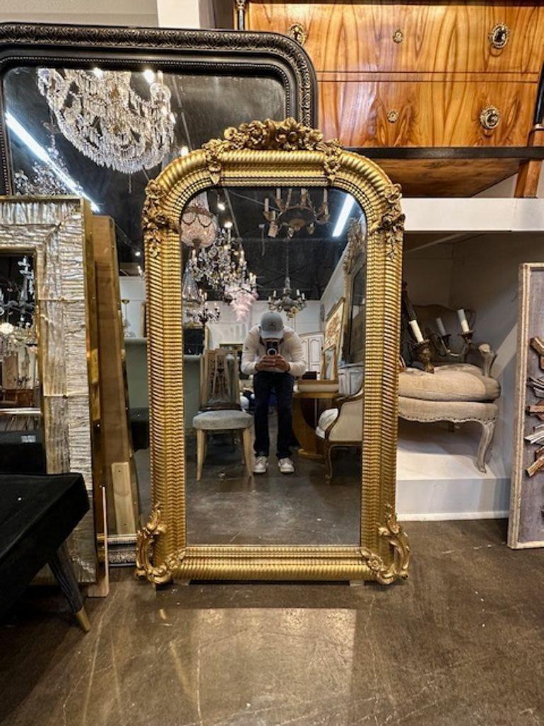 Fine French Art Nouveau carved and giltwood mirror. Circa 1910. Sure to make a statement!