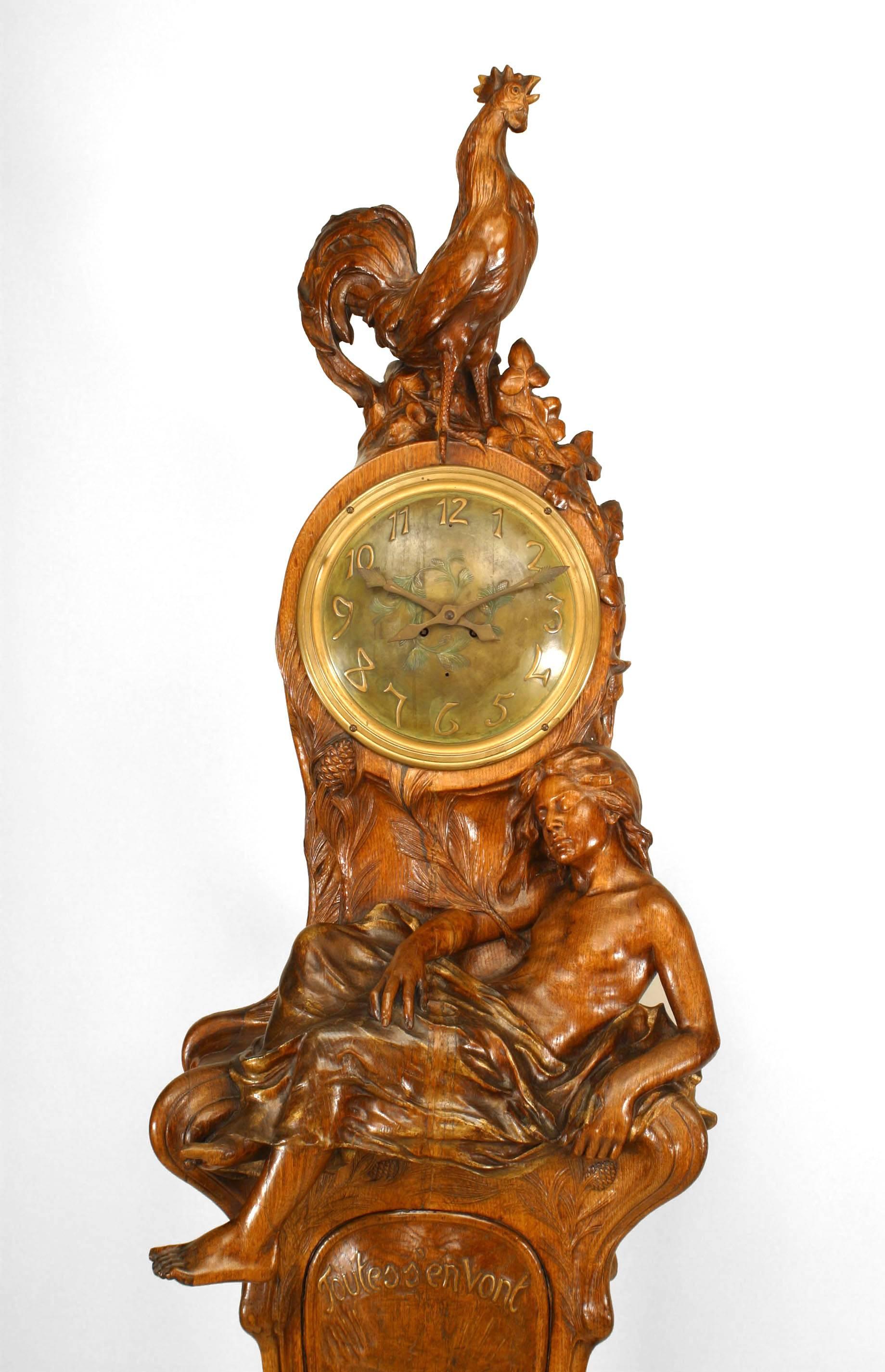 French Art Nouveau oak grandfather clock with carved sleeping lady and rooster on top (Georges Turck) (pg. 153, Fantasy Furniture). Currently does not run. 

 