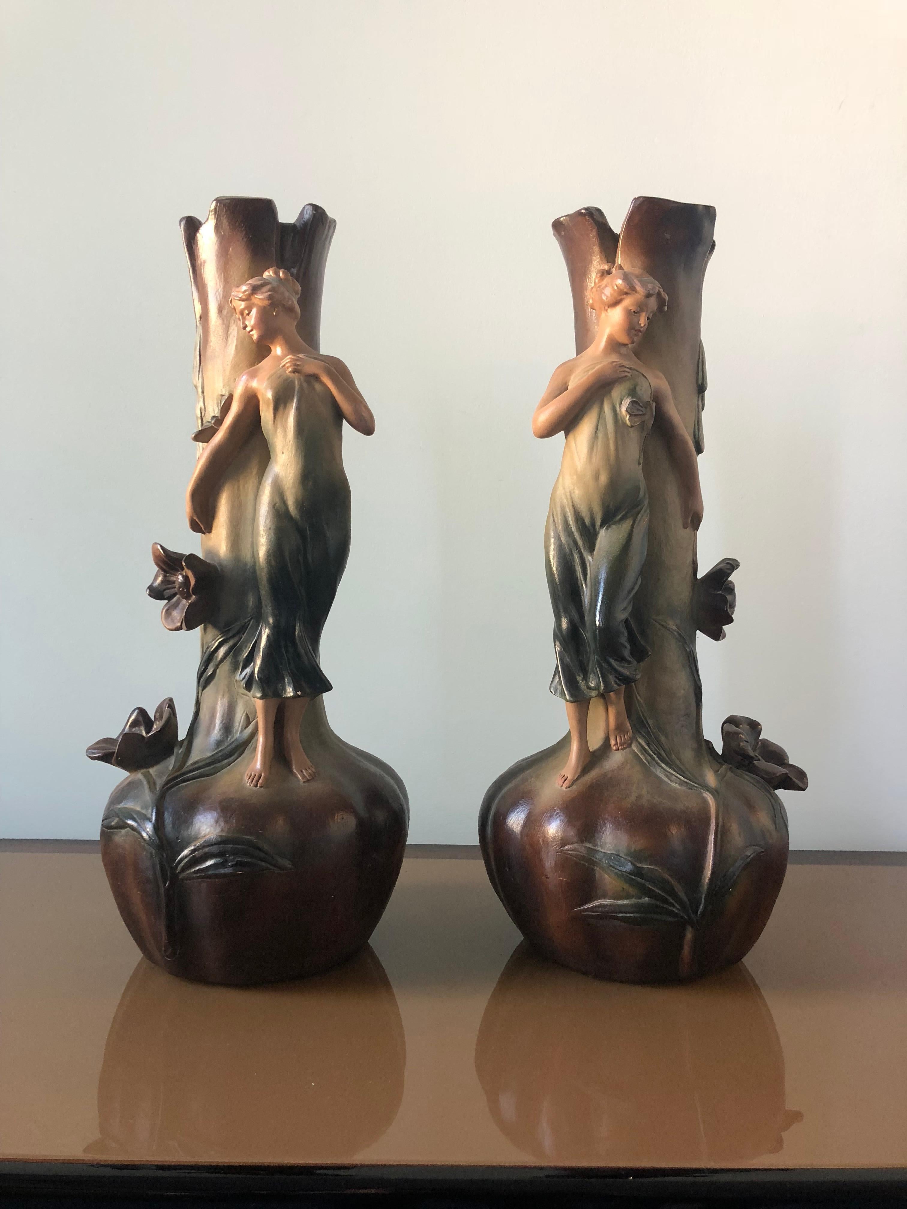 A stunning French Art Nouveau pair of large vases with female figures of the era, circa 1910.