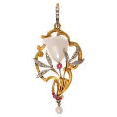 French Art Nouveau Pendant with Big Mississippi Dog Tooth Pearl, Diamonds Rubies