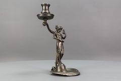 French Art Nouveau Pewter Candlestick with a Lady Sculpture, ca. 1920