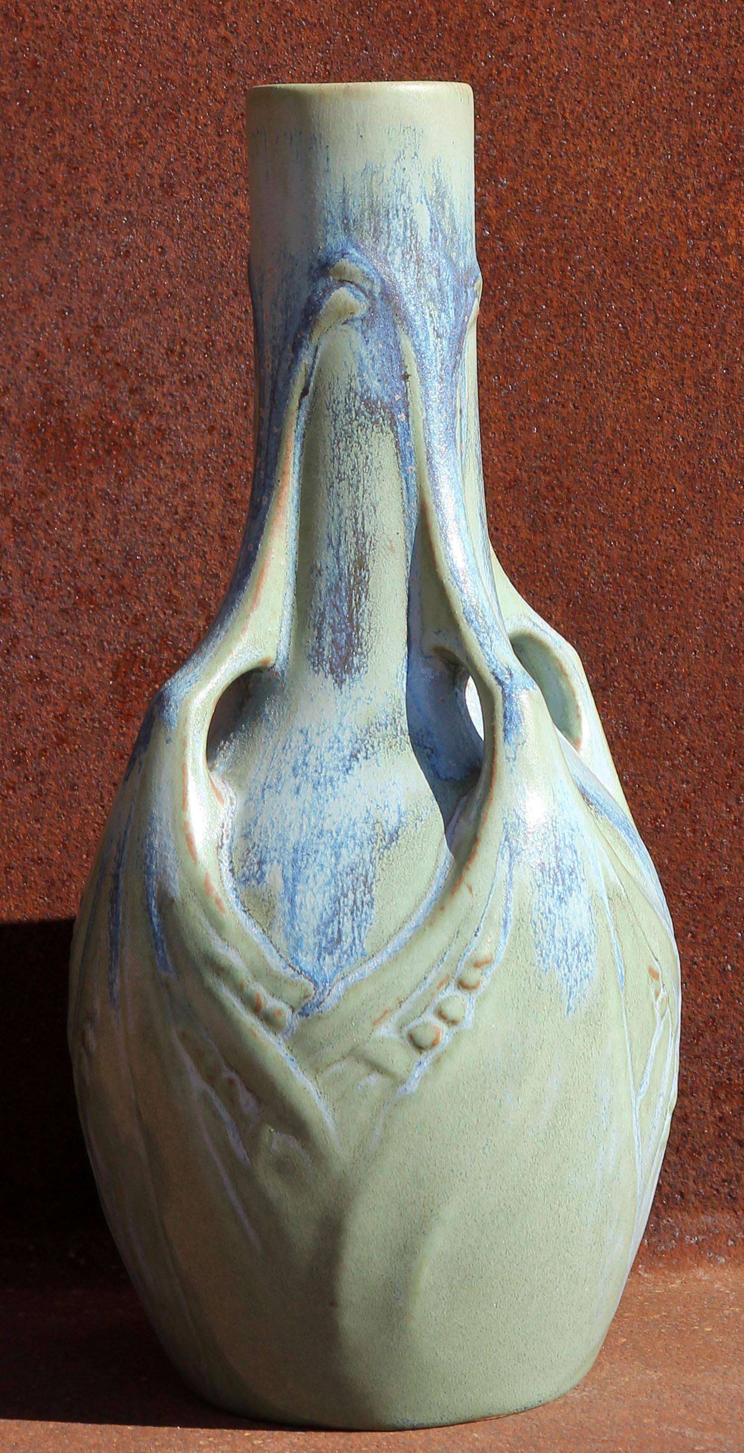 Art Nouveau pottery vase with blue and green drip glaze. By French maker Denbac.