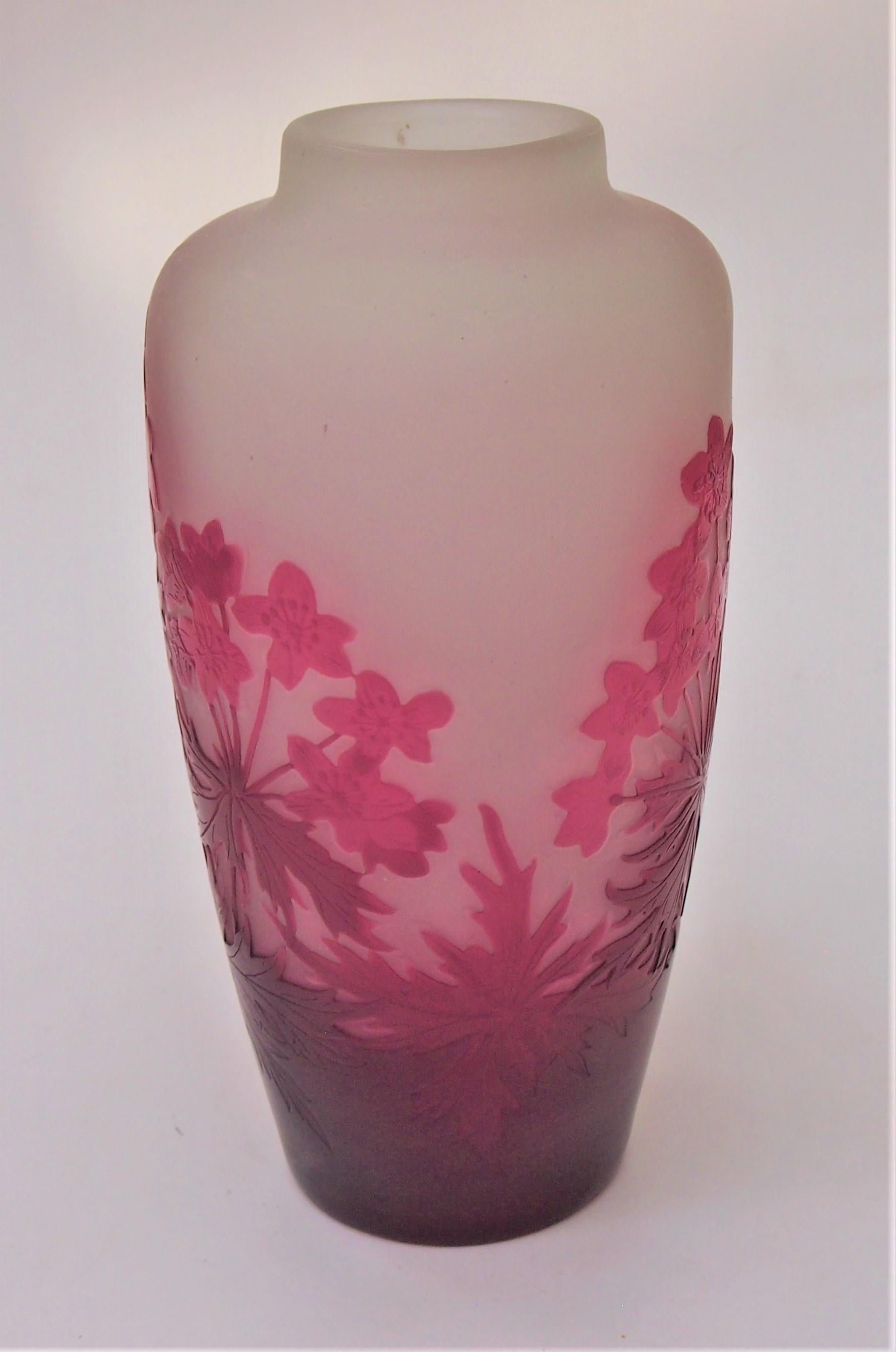 Beautiful signed French Art Nouveau Emile Gallé botanical cameo vase depicting flowers in reds over frosted clear. A good size; the oval profile vase has mostly clear shoulders with a short raised neck making a quite dramatic effect - a classic