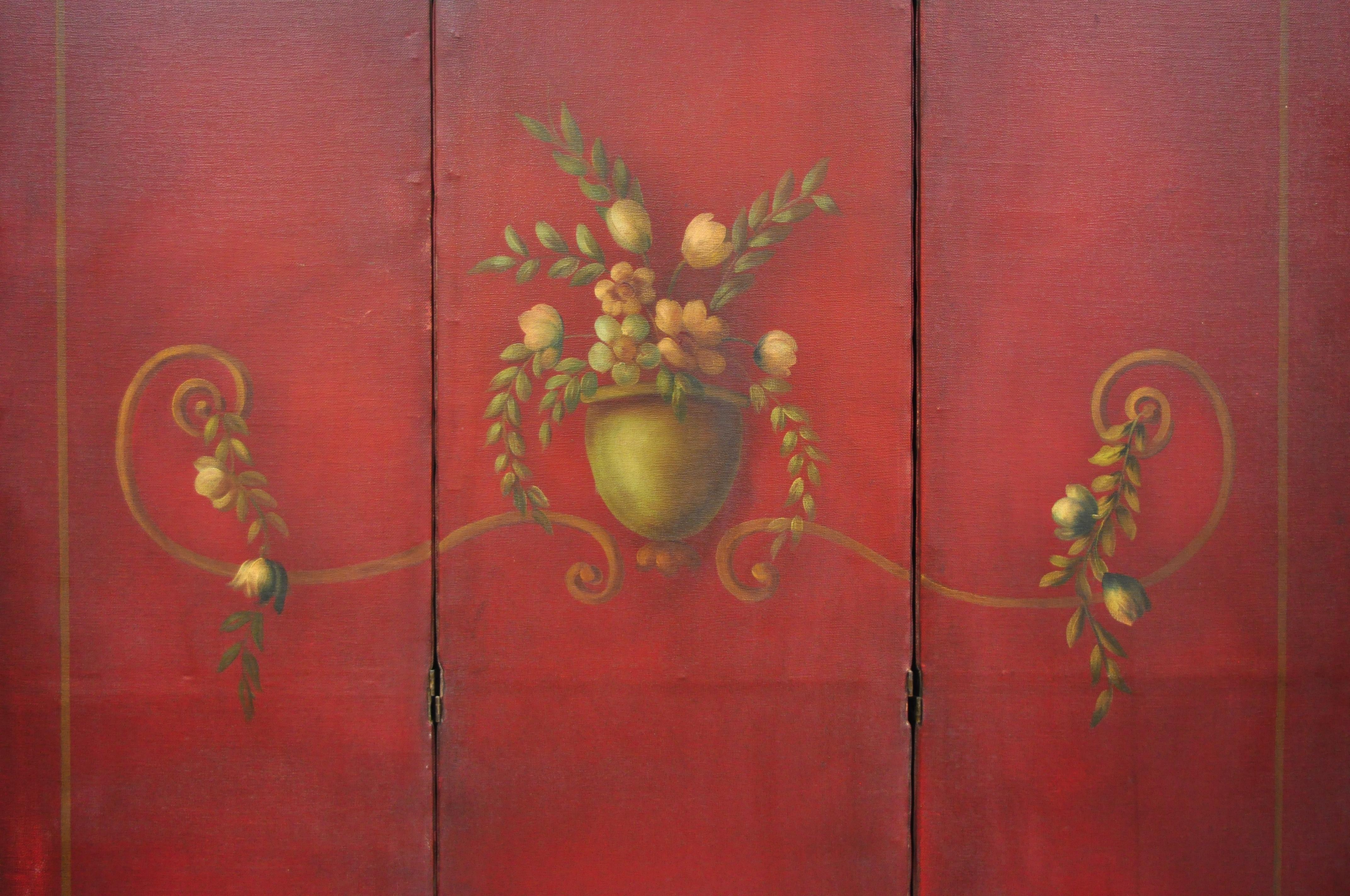 French Art Nouveau red oil on canvas hand painted 3-panel dressing screen. Item features 3 panels, red canvas, hand painted flowers, folding sections, very nice antique item, circa early 20th century. Measurements: (open) 68